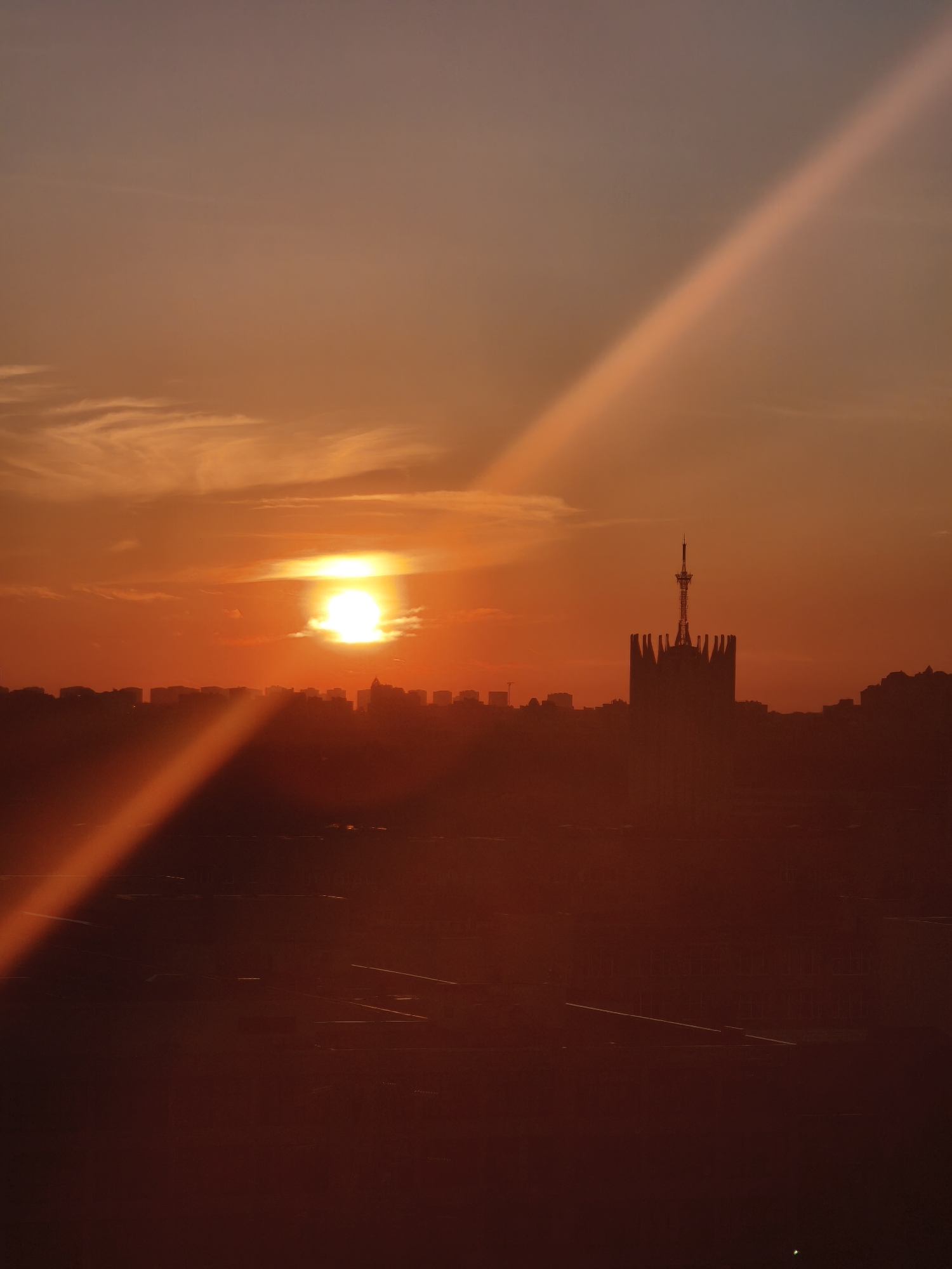 Sunset observed over Saint Petersburg with distinctive light beam