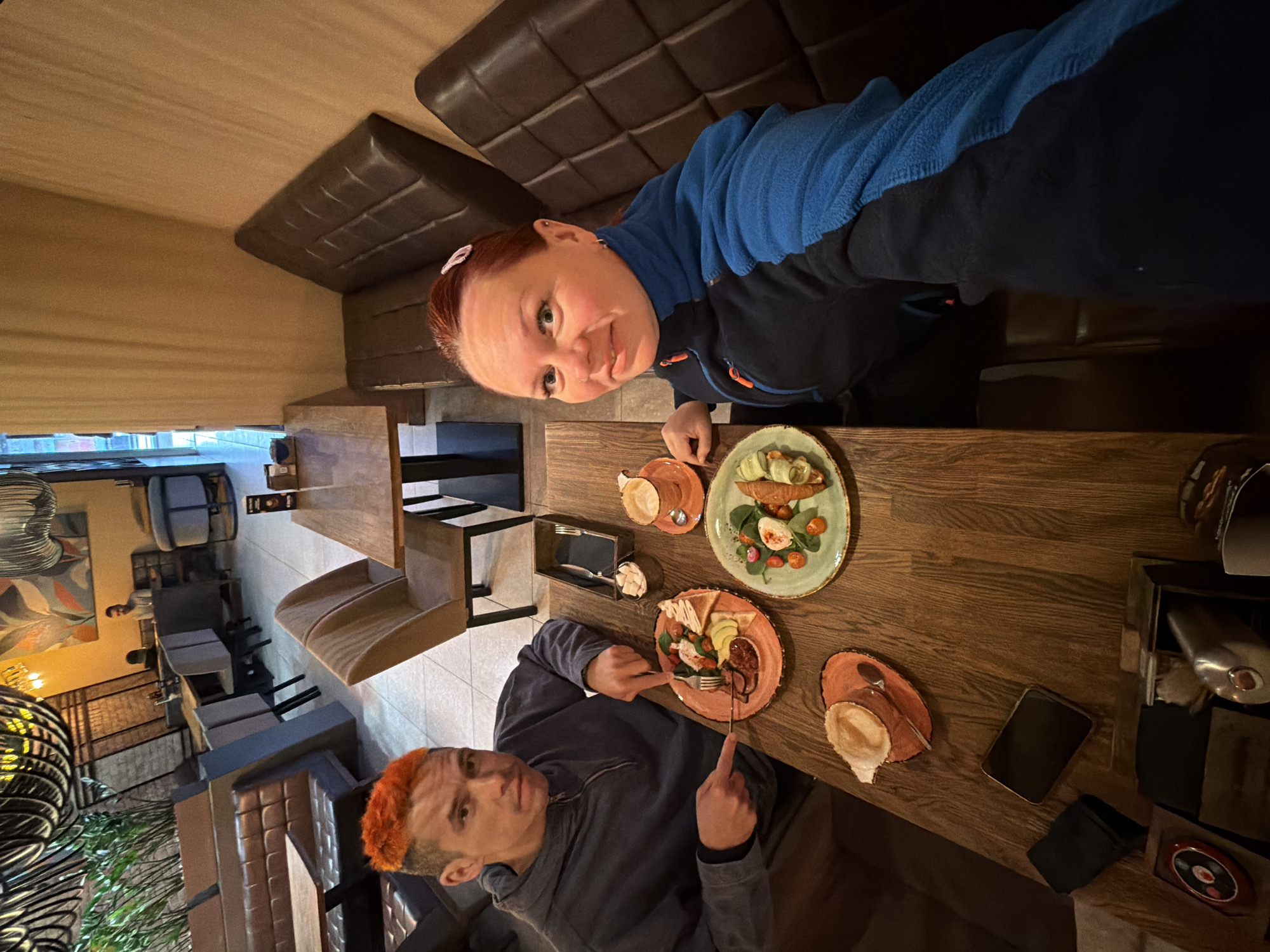 Two diners at Grill House restaurant early morning