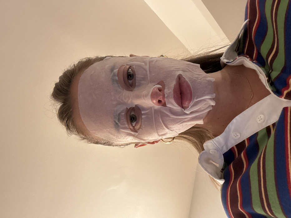Person spotted wearing white sheet face mask