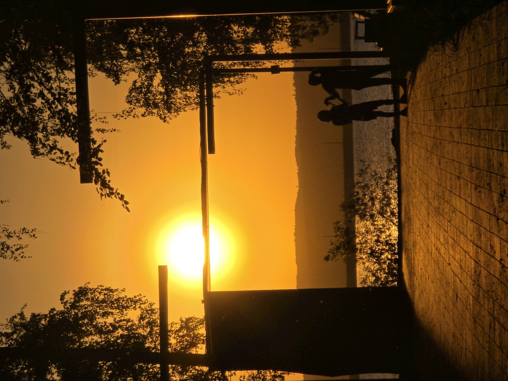 Families enjoy sunset evening at Chaikovsky park and reservoir