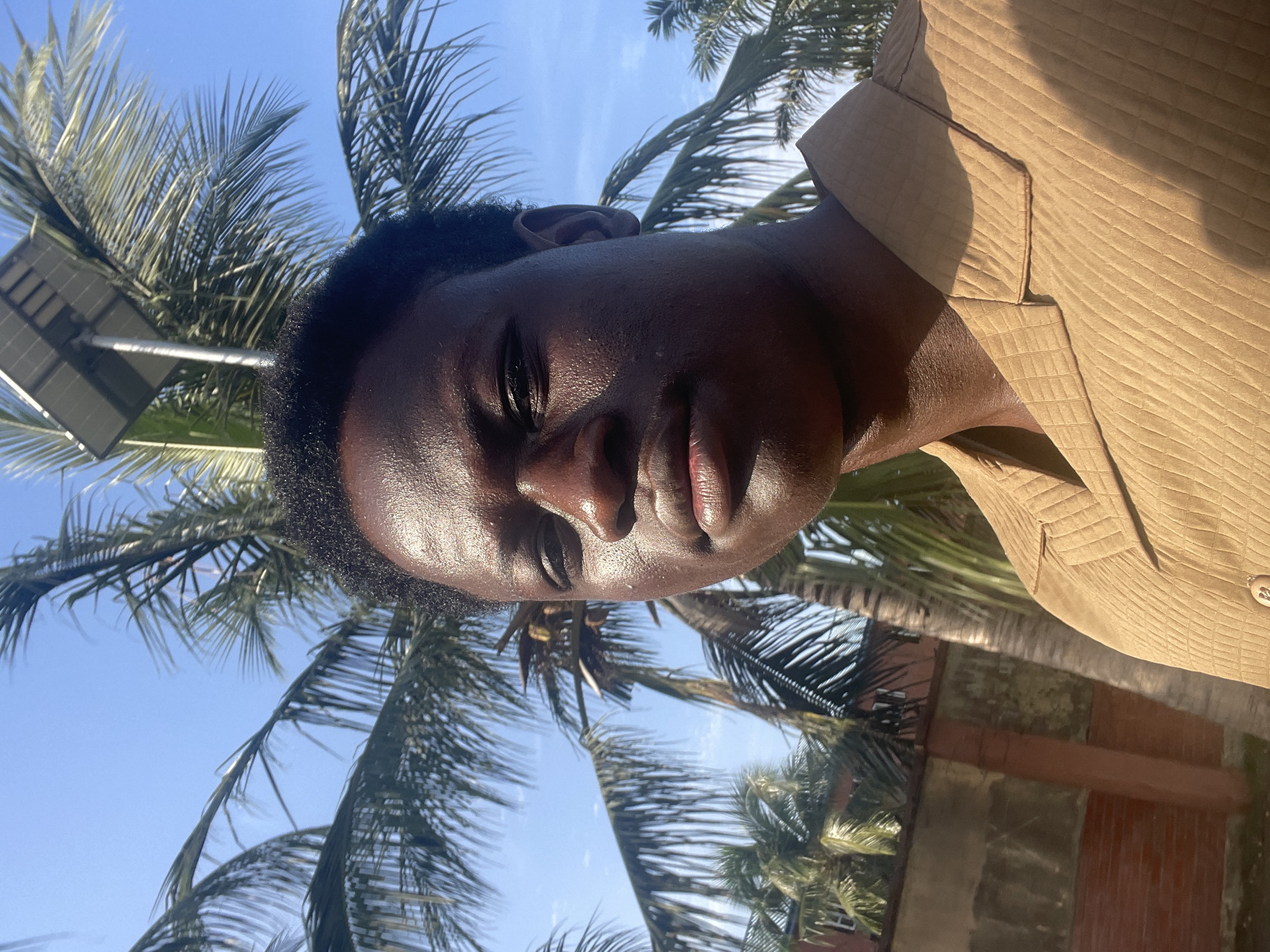 Person photographed in morning sunlight in Badagry, Nigeria