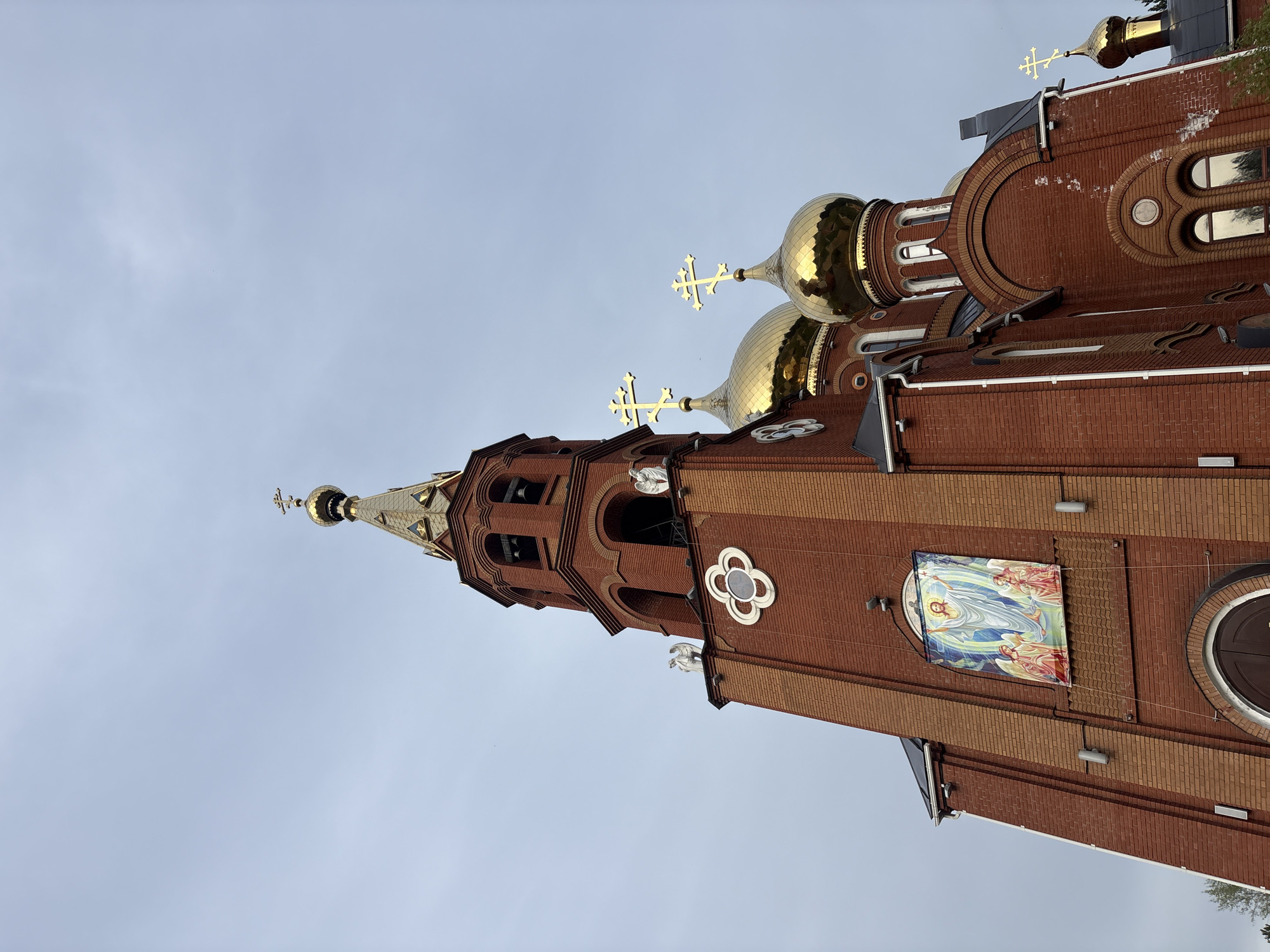 Spring afternoon at church playground complex in Chaikovsky, Russia