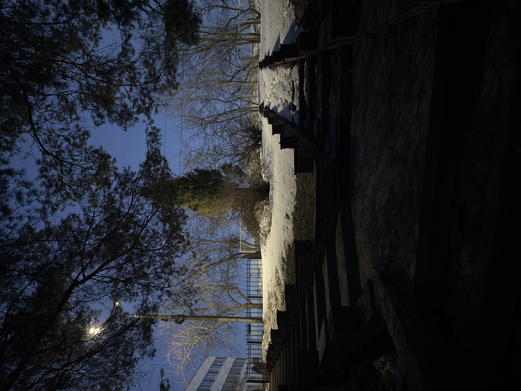 Evening walk documented through snowy Chaikovsky streets at twilight
