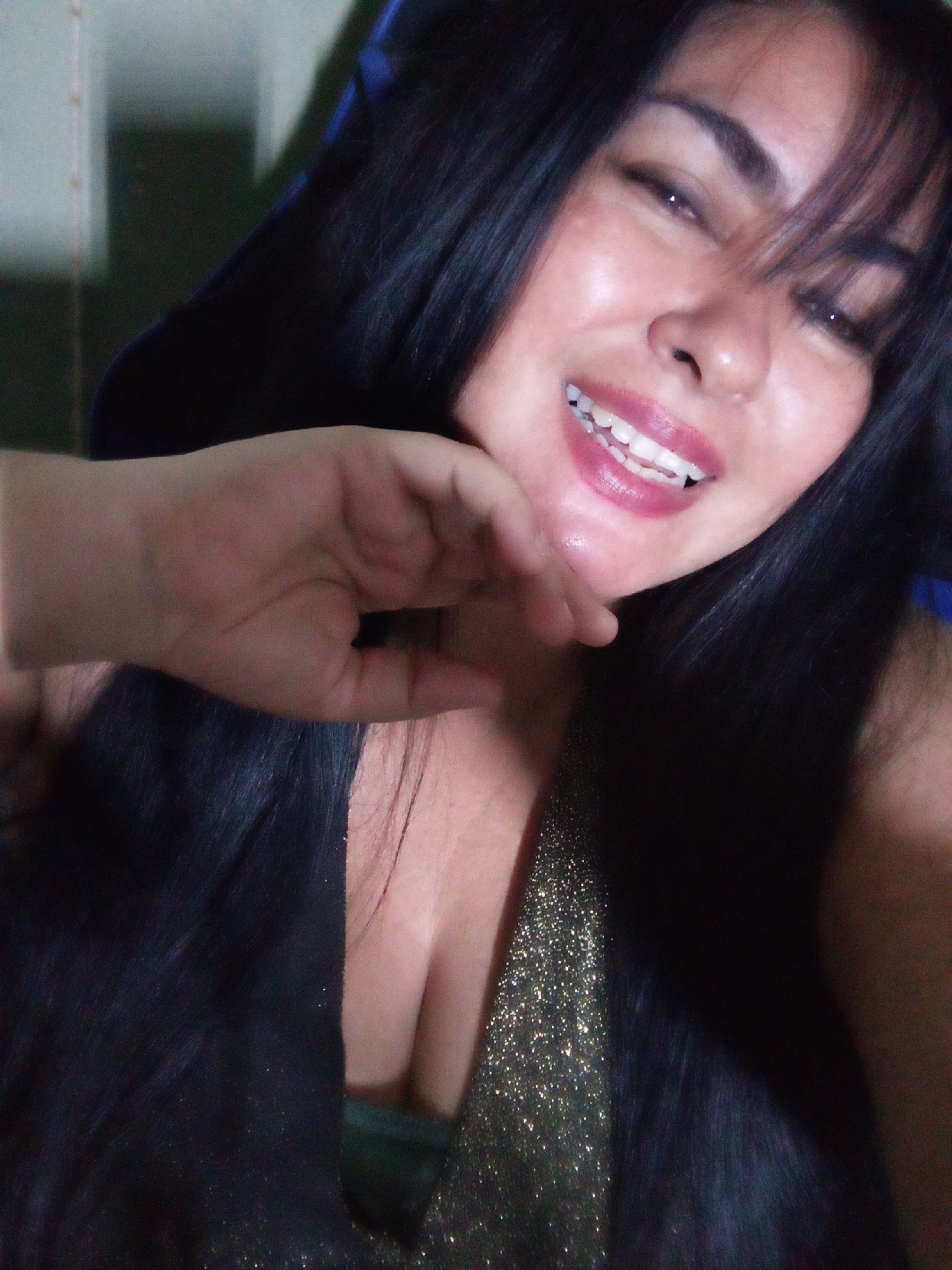 Woman takes late-night selfies in Juan Griego bedroom