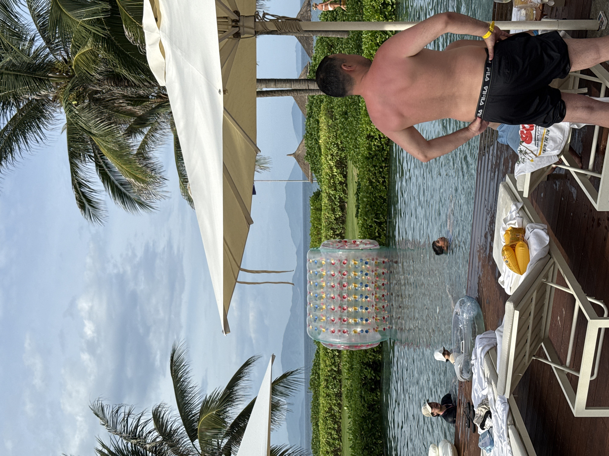 Quiet morning at a Vietnamese beachside resort, pool and grounds