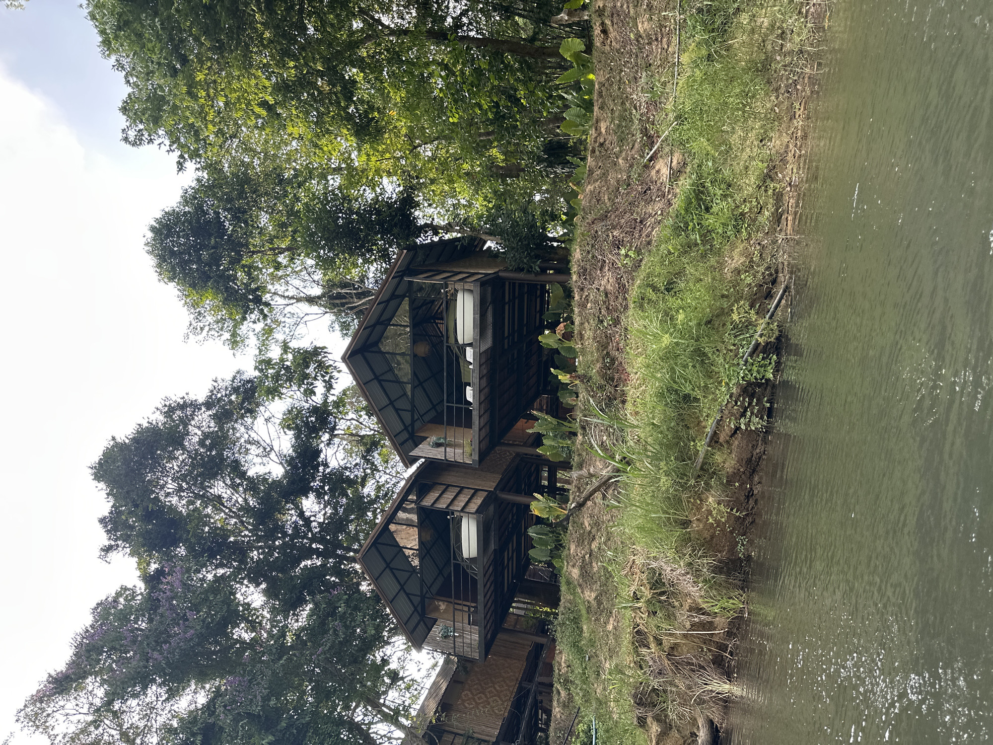 Stilted bungalows captured along Khlong Sok waterfront, Thailand