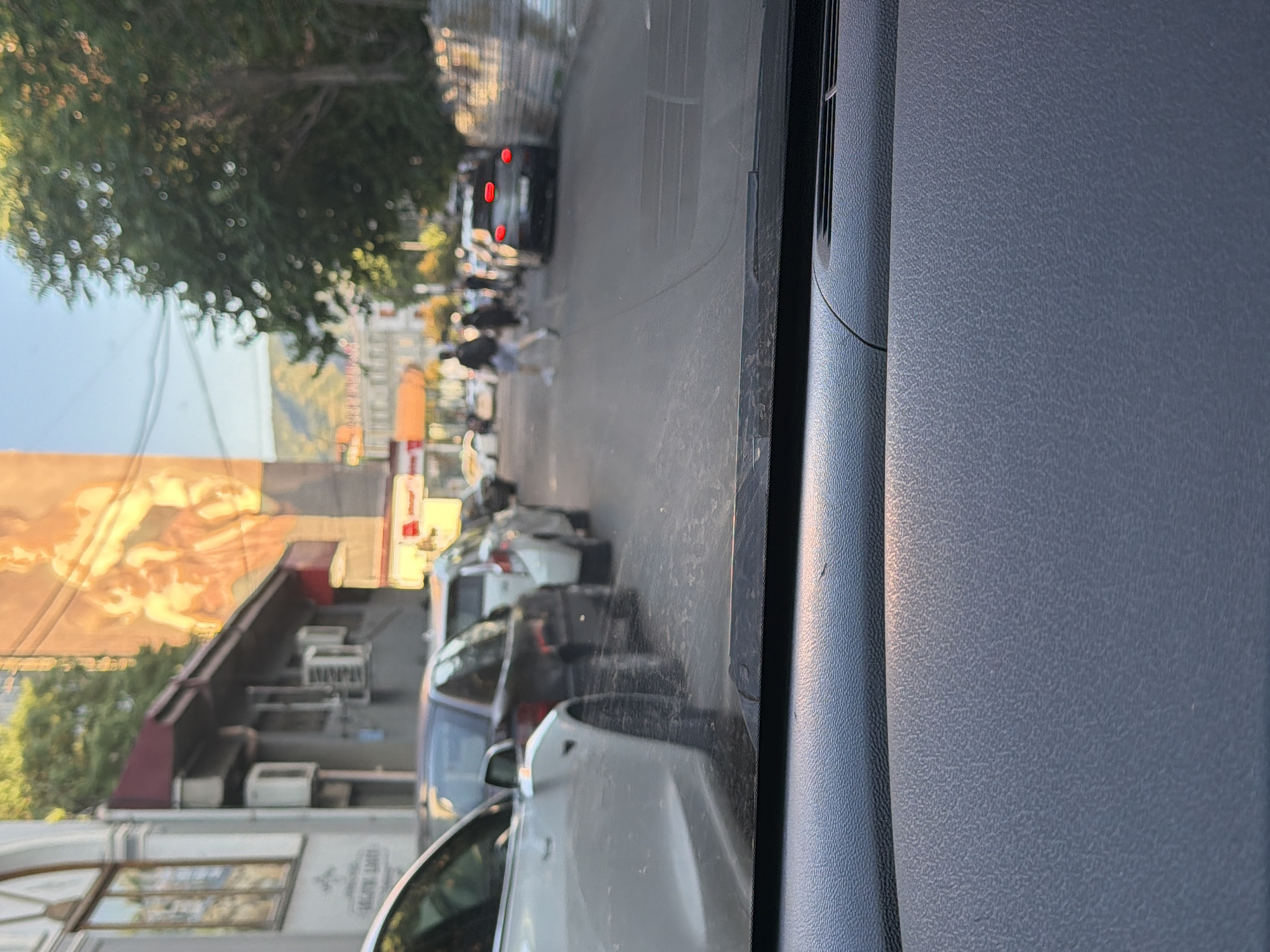 Tbilisi street life: traffic, food stalls, and vendors midafternoon