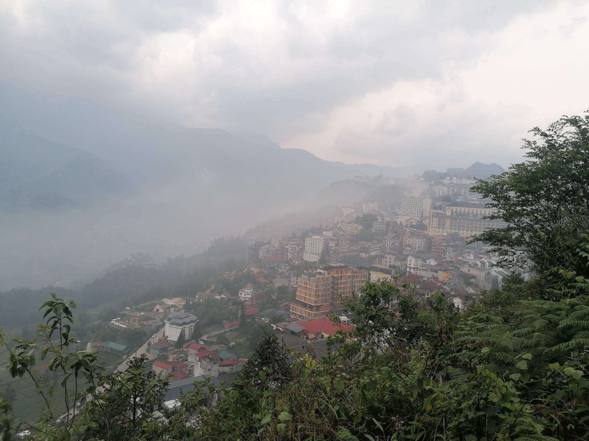 Morning fog blankets Sa Pa as observer documents traditional mountain town