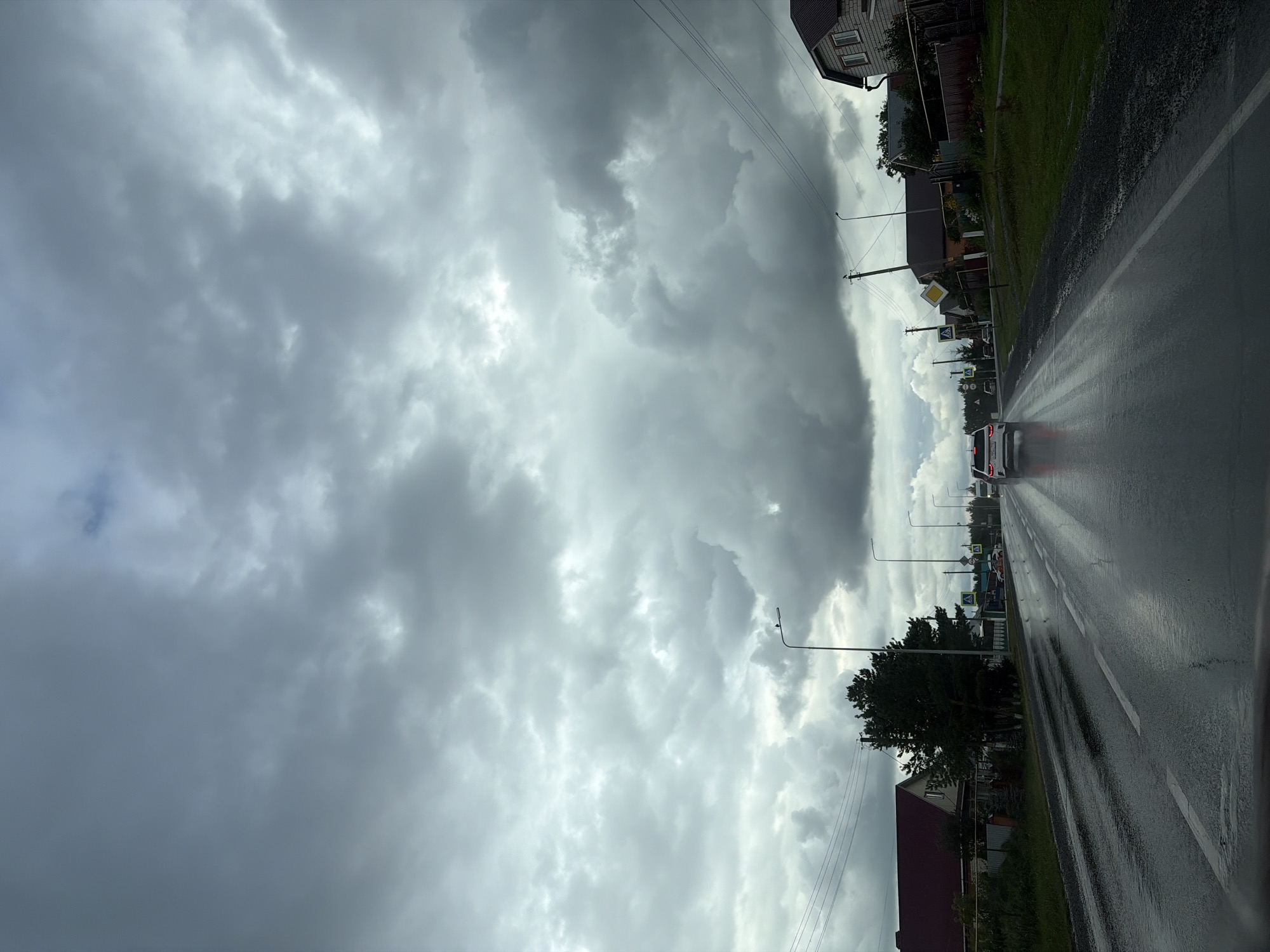 Rainy drive through rural Russia past fields and landmarks