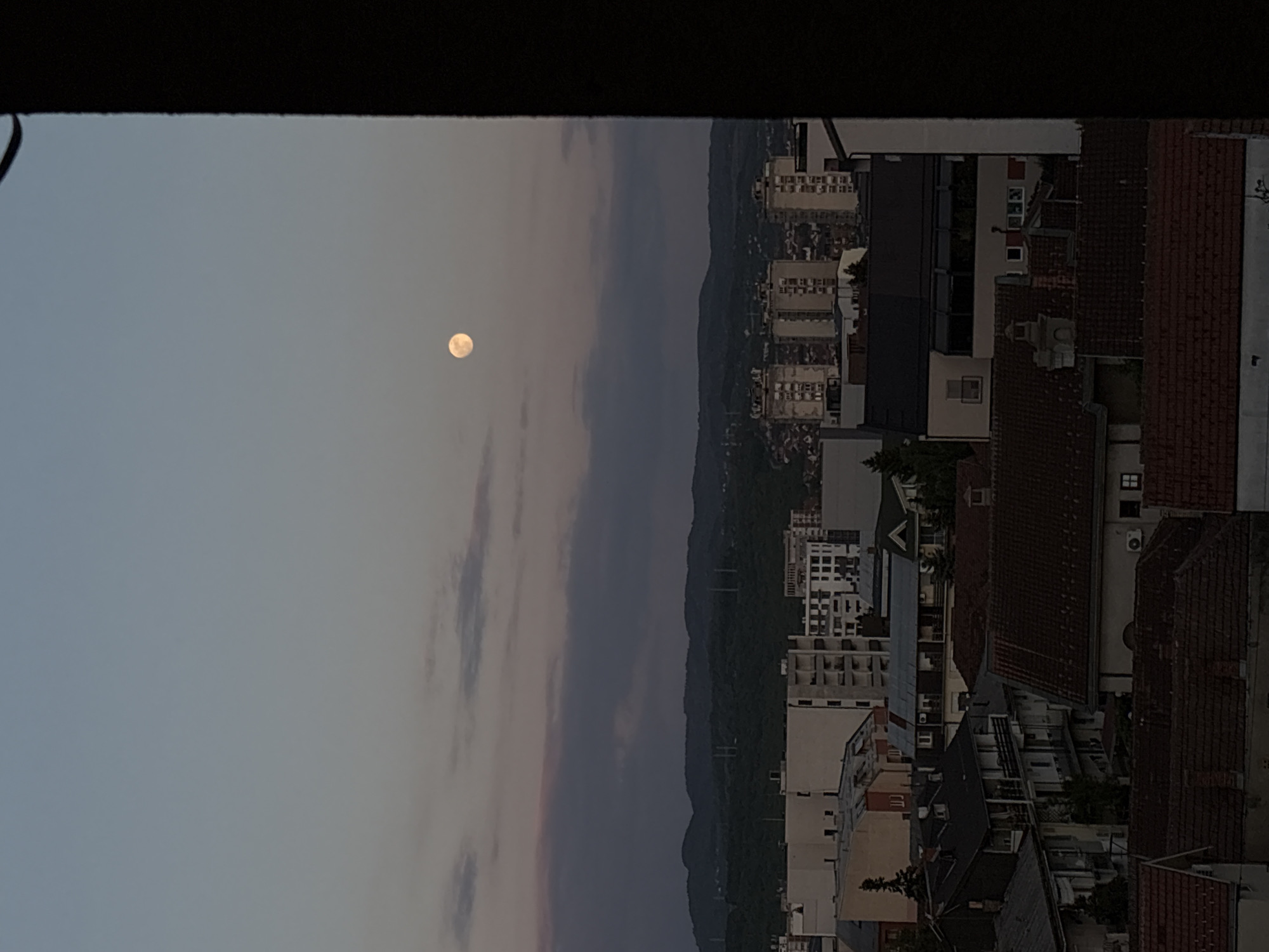 Twilight moon and indoor portrait captured in Kragujevac