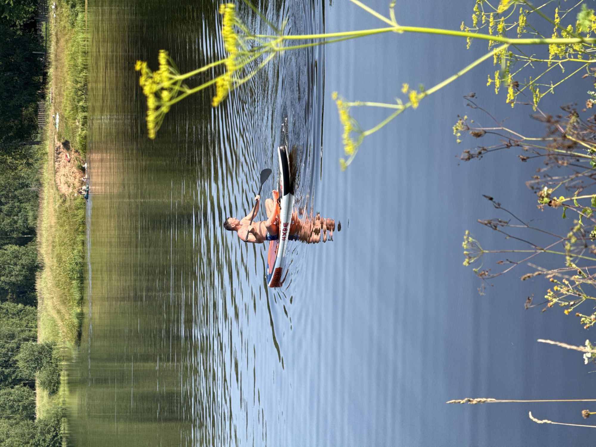 Lazy summer day on the river: paddleboarding, selfies, and hookah