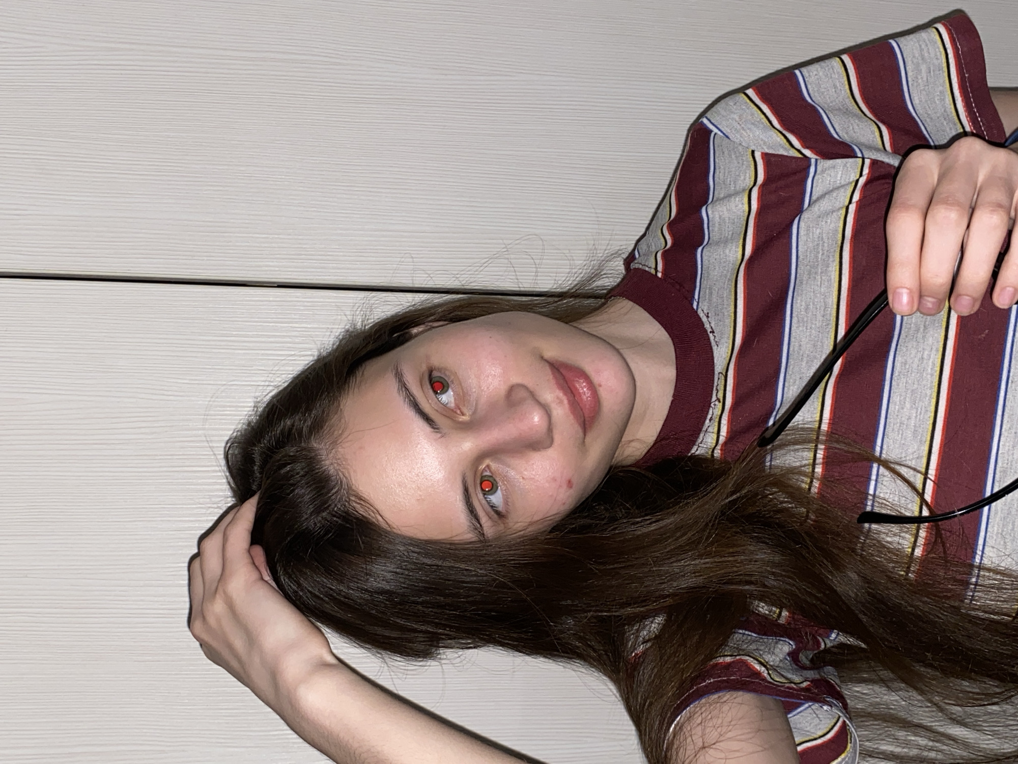 Young woman documents personal selfie session in Votkinsk, Russia