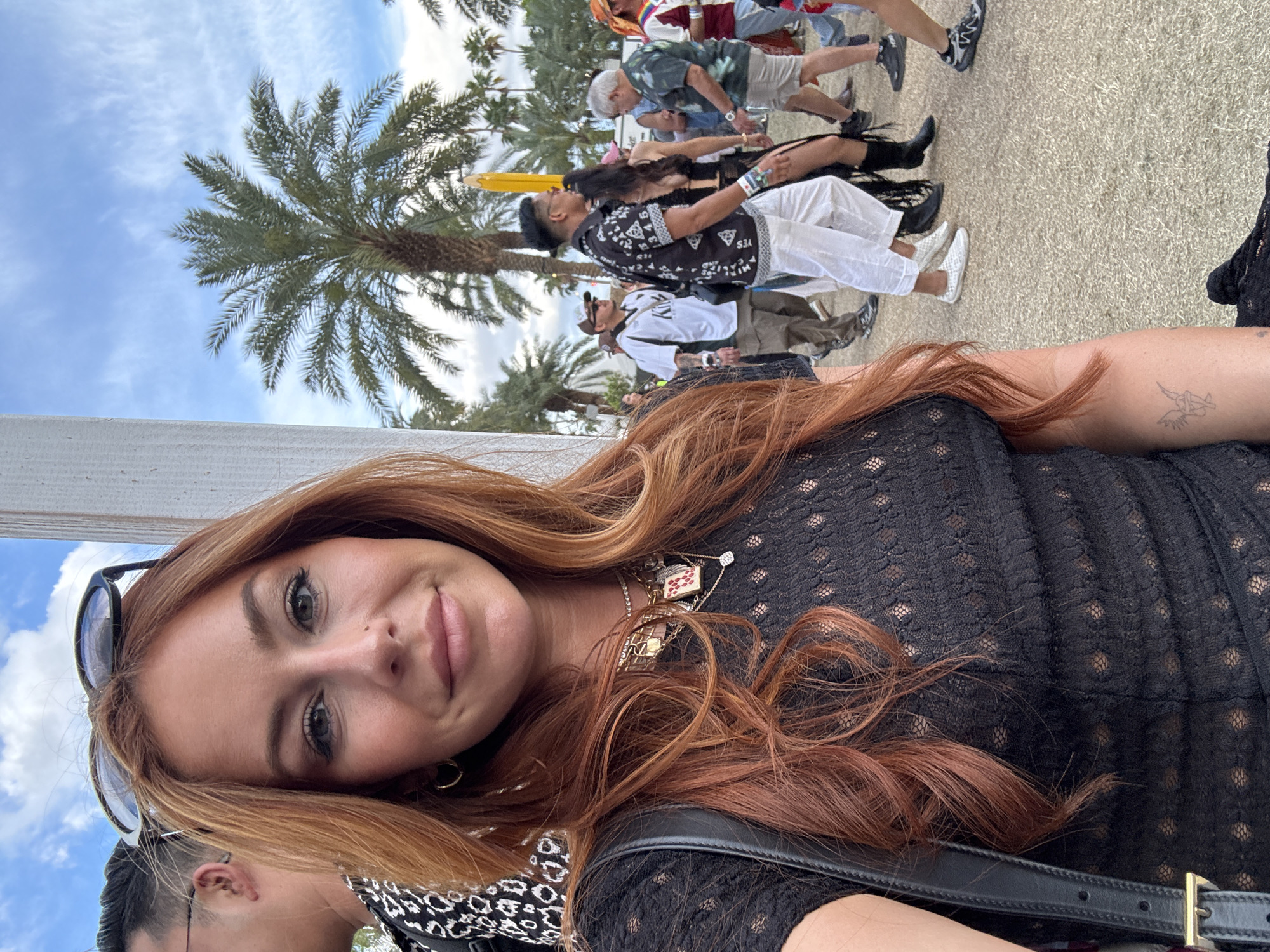Woman takes selfie in Coachella early Sunday morning