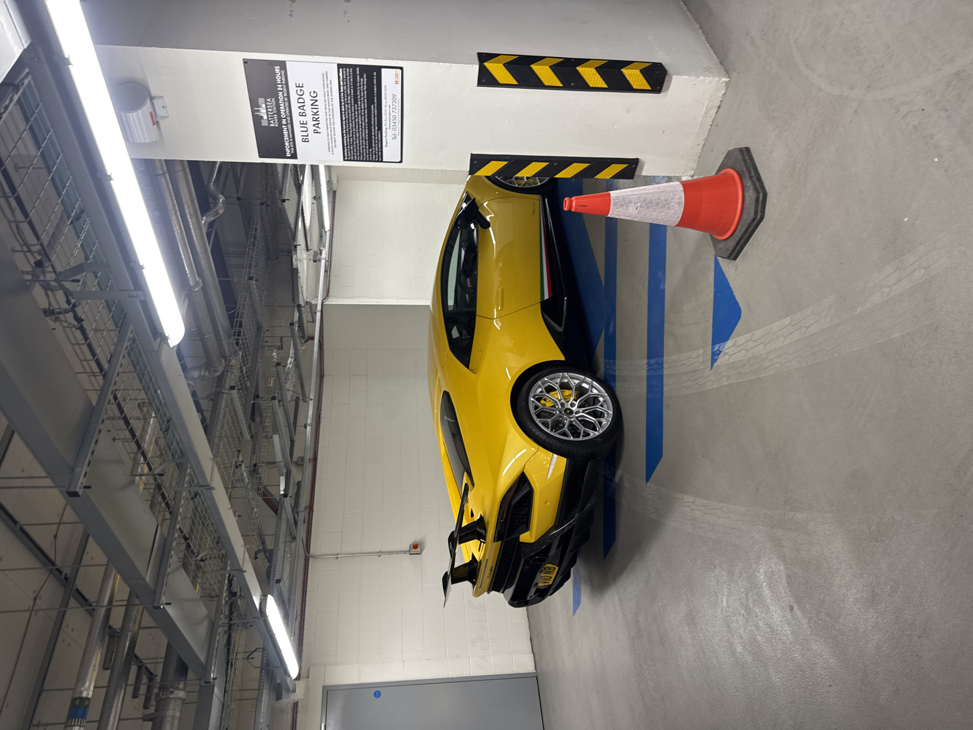 Sports car illegally parked in disabled space at Battersea
