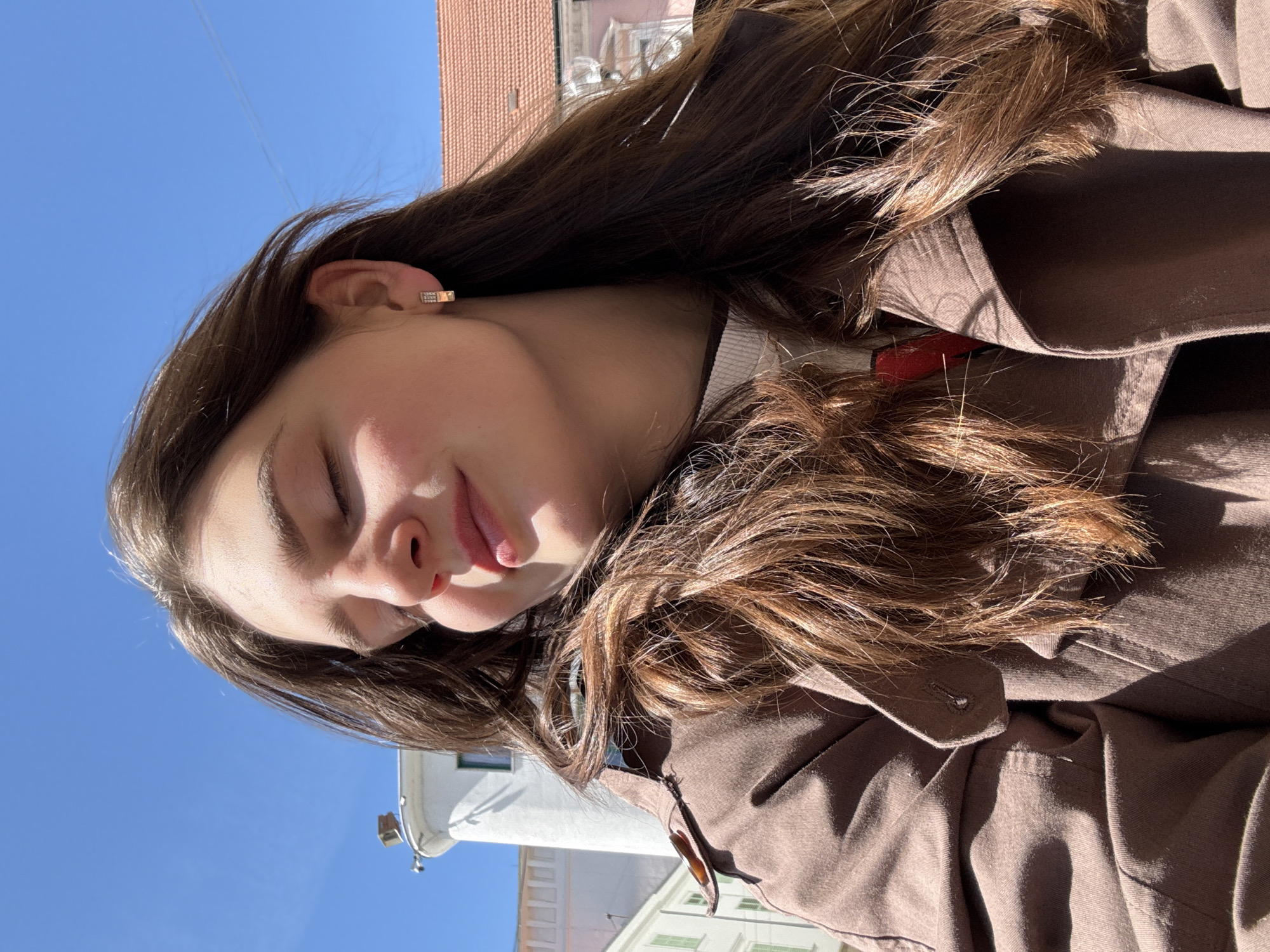 Morning cafe life captured in Trnava's sunlit square