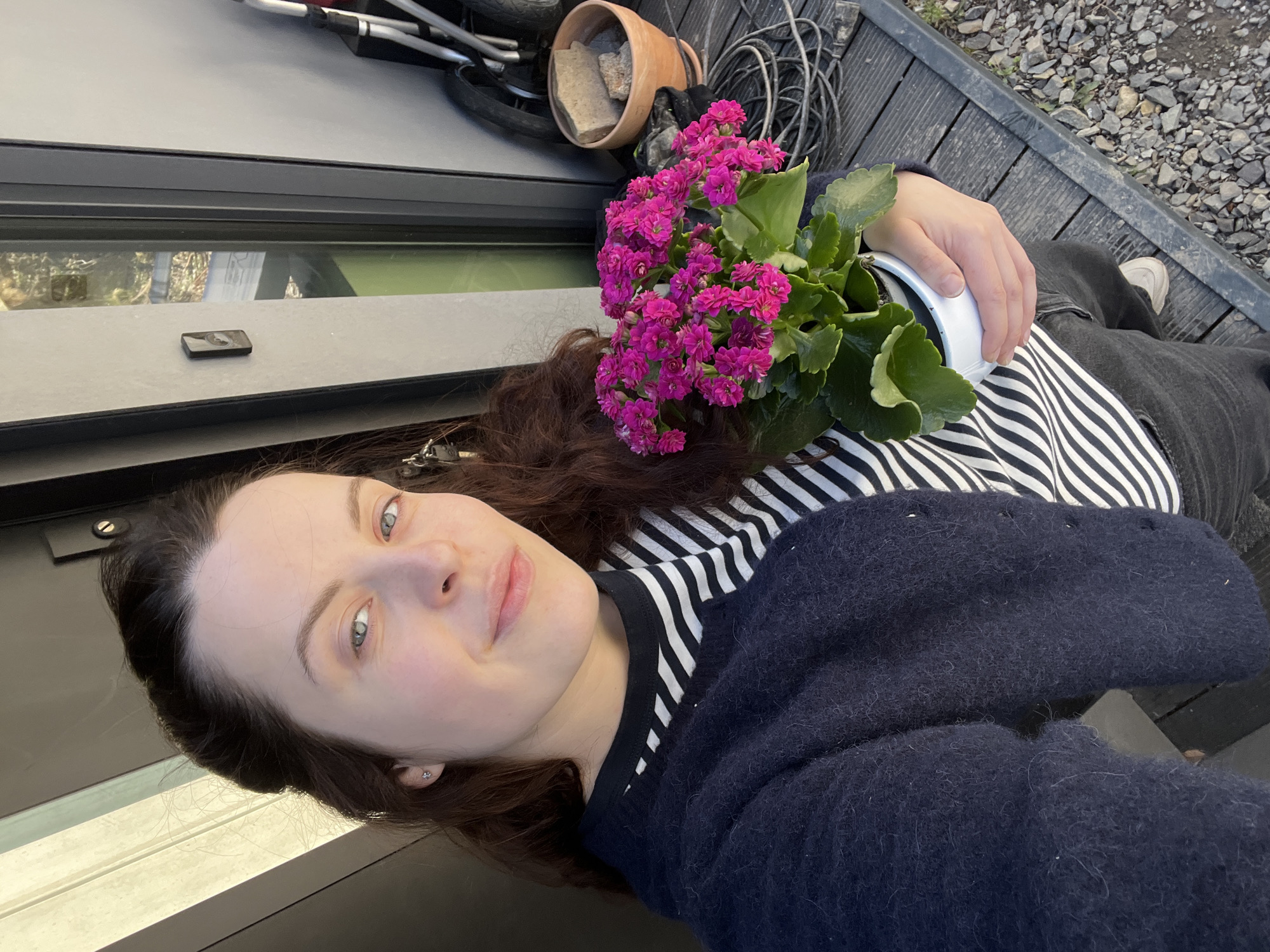 Family enjoys outdoor moments with flowers and play in Gangloff