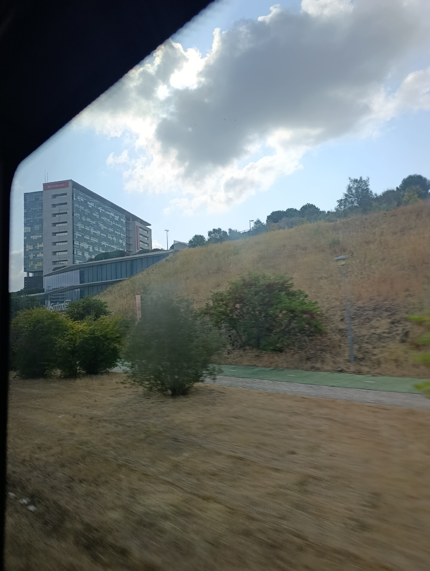 Rolling through Lisbon past Santander HQ and Hotel America