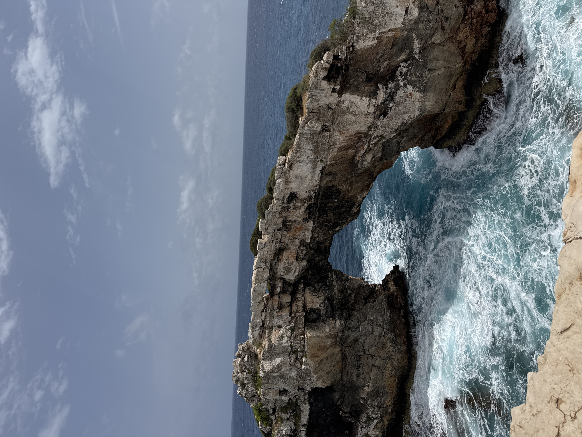 Natural rock arch Es Pontàs observed off Santanyí coast