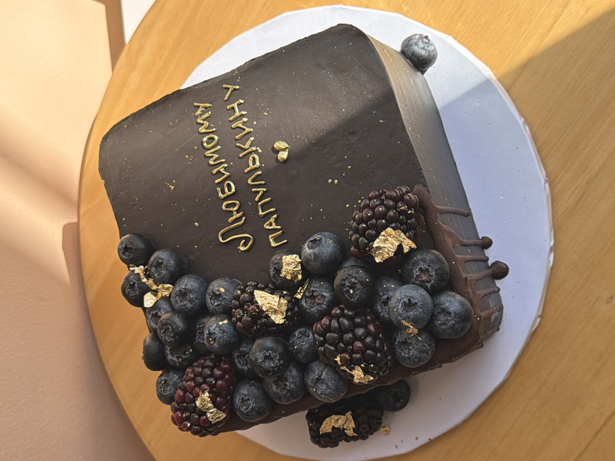 Decorated chocolate cake with Russian inscription prepared in Tel Aviv