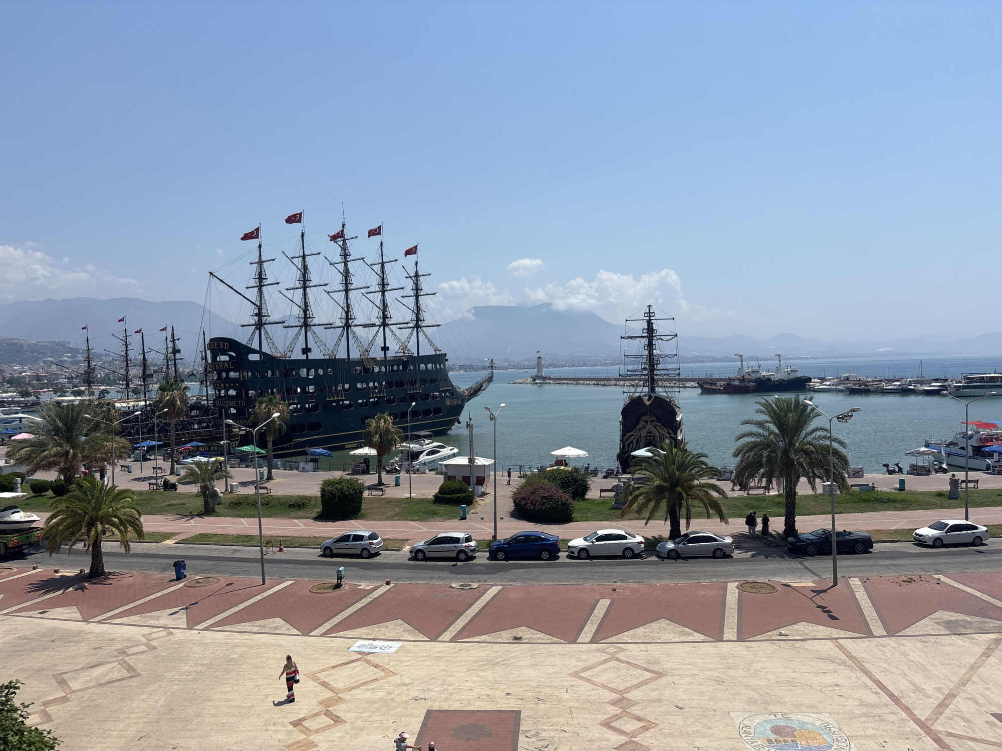 Alanya harbor: promenade, pirate ship, and waterfall feature