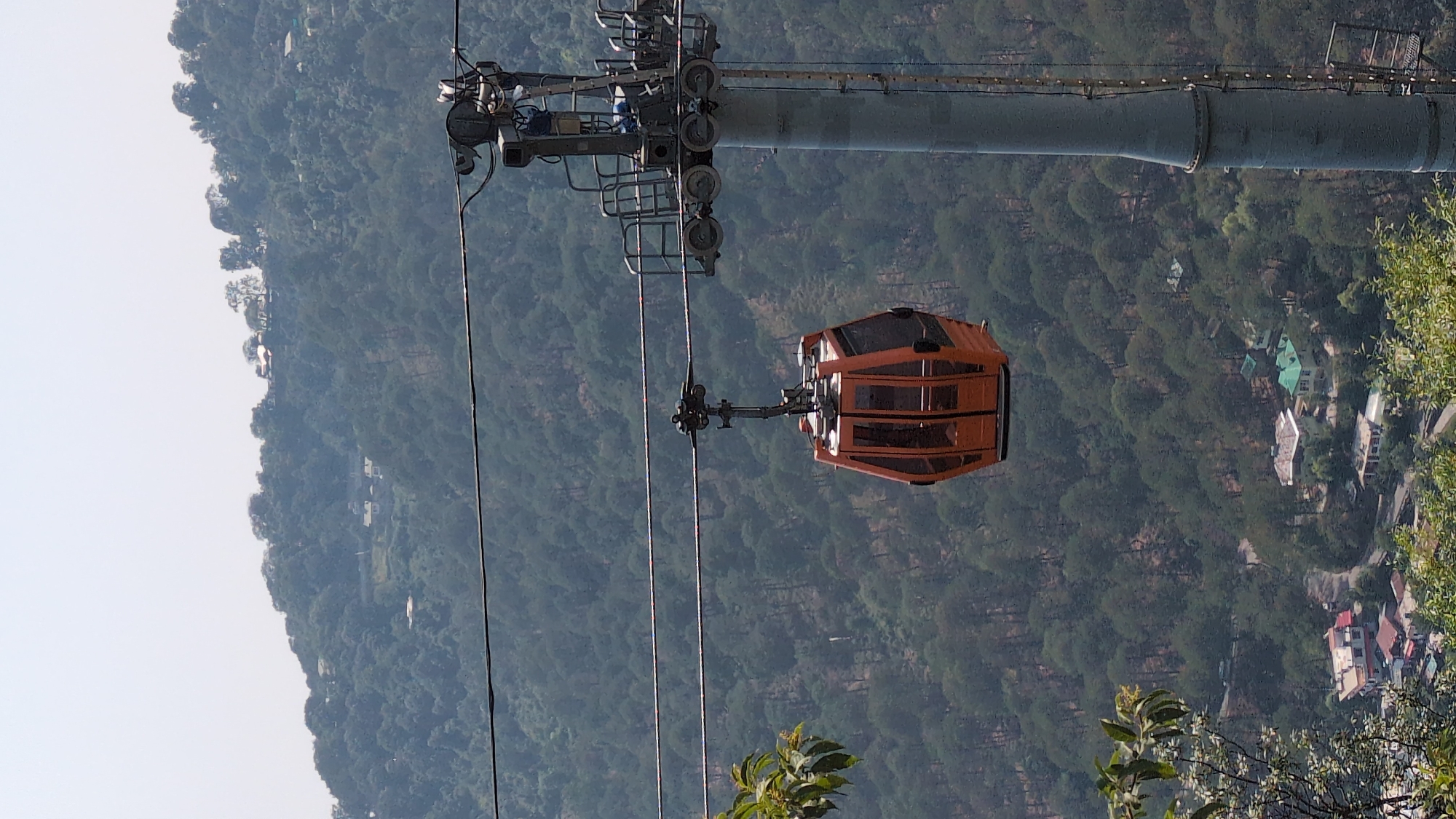Daily life captured across Dharamshala temples, cable cars, streets