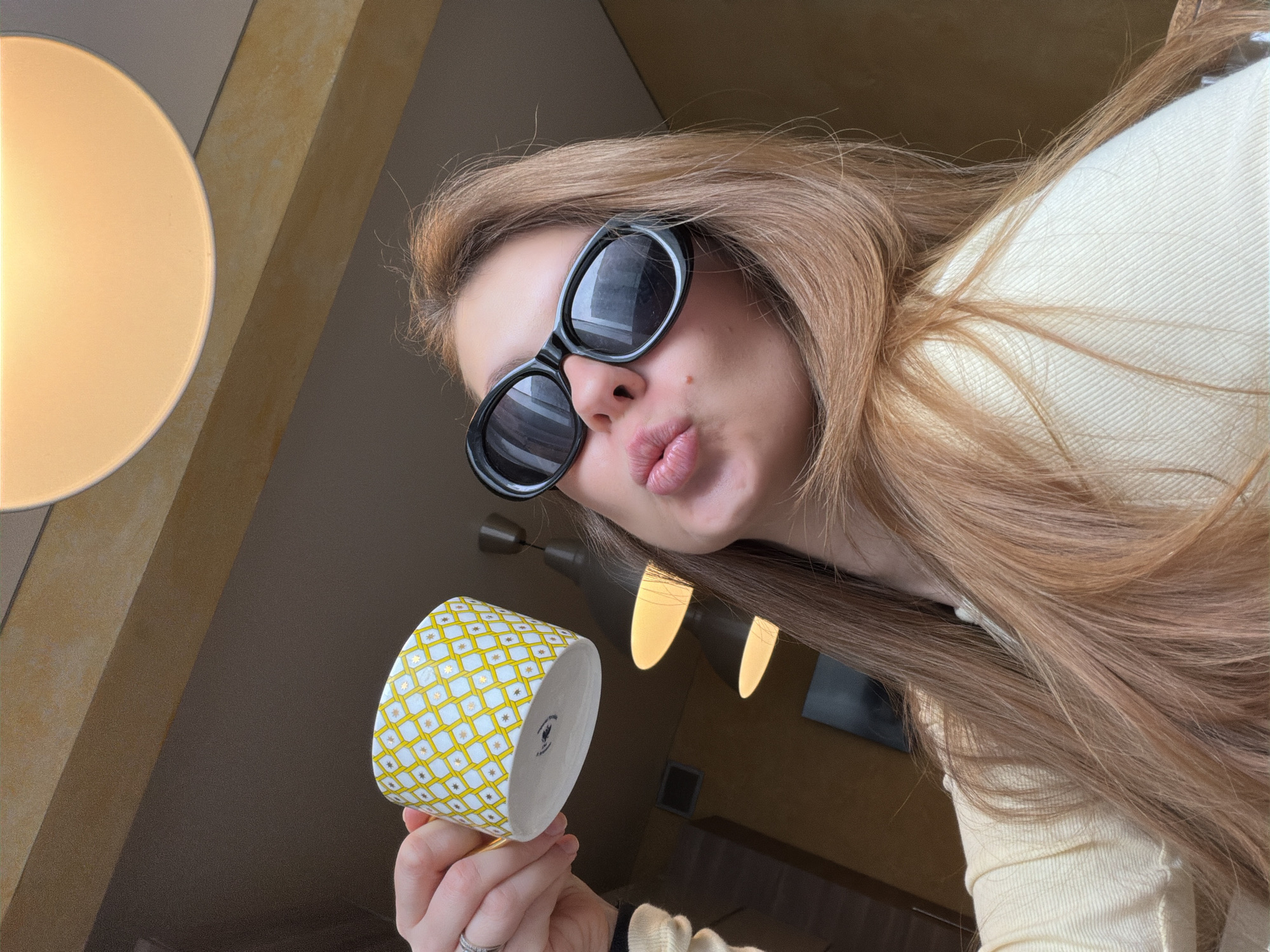 Woman photographed with coffee mug in Khimki selfie session
