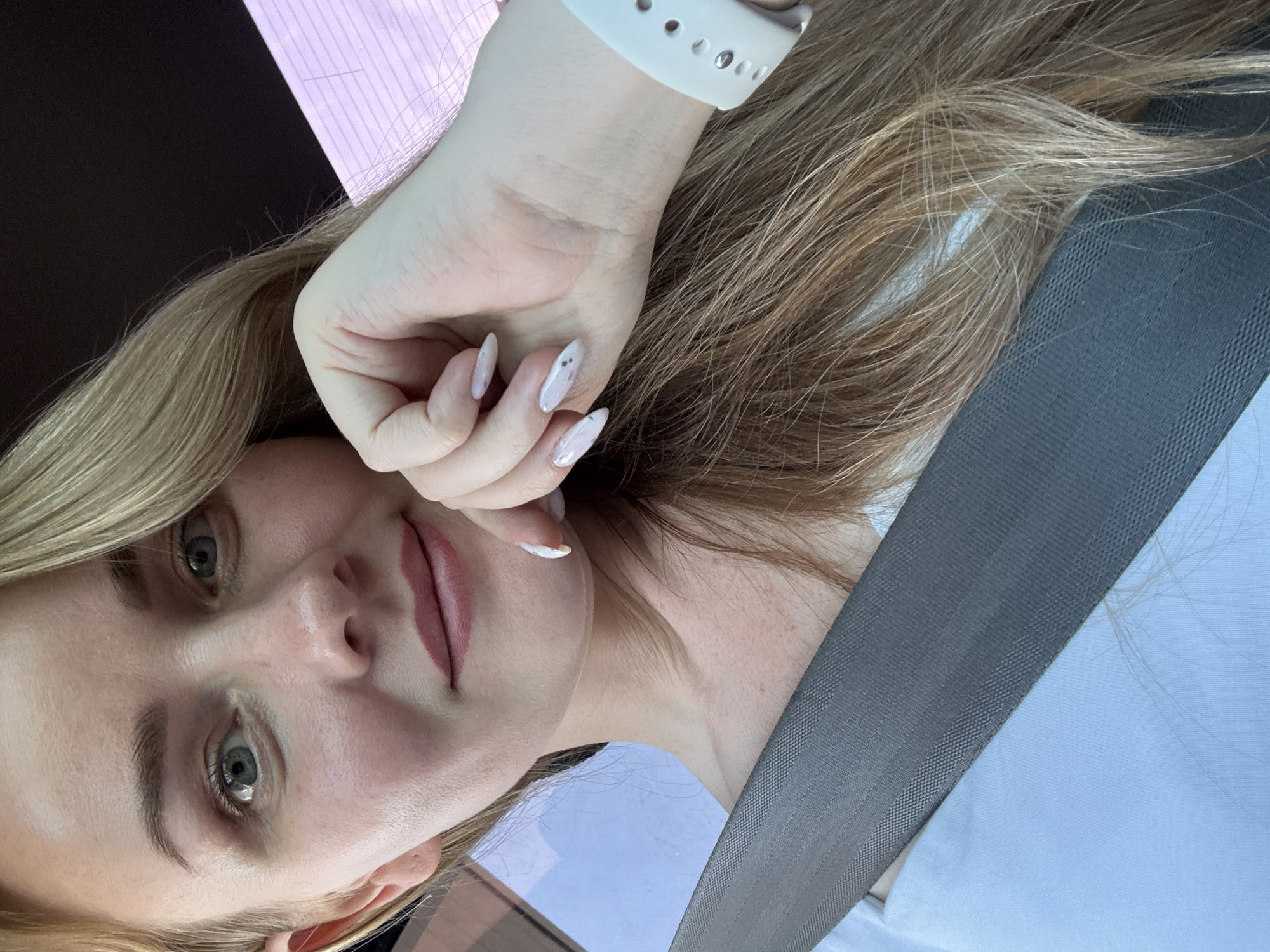 Woman photographed in car in Chaikovsky, Russia
