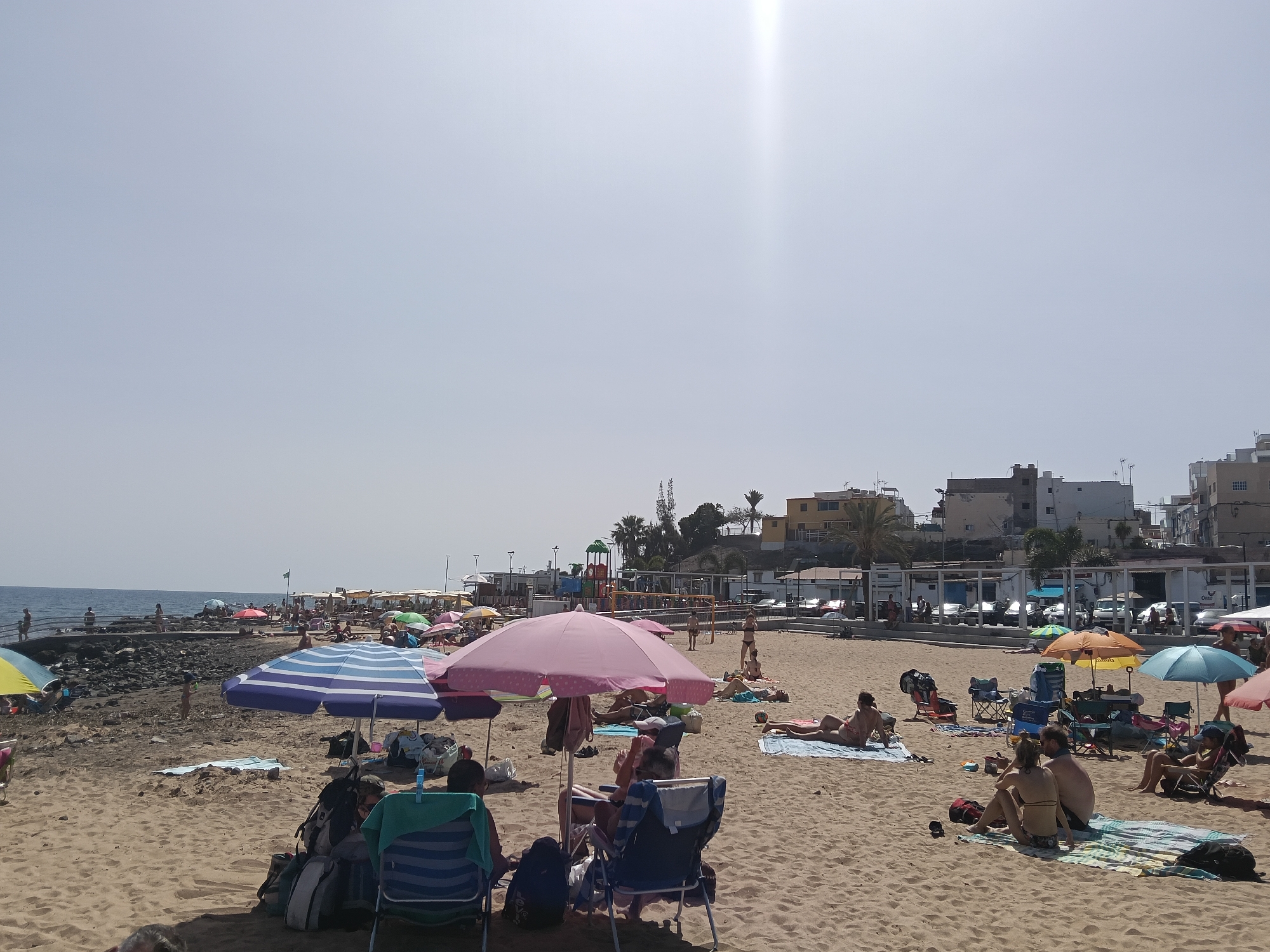 Beach day activity captured at Mogán, Spain