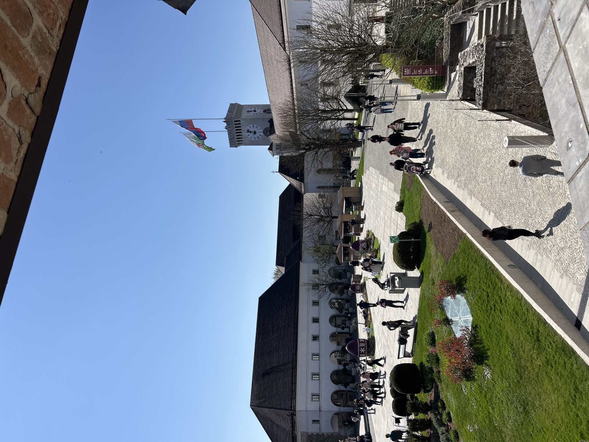 Tourist crowds gather at Ljubljana Castle on sunny morning