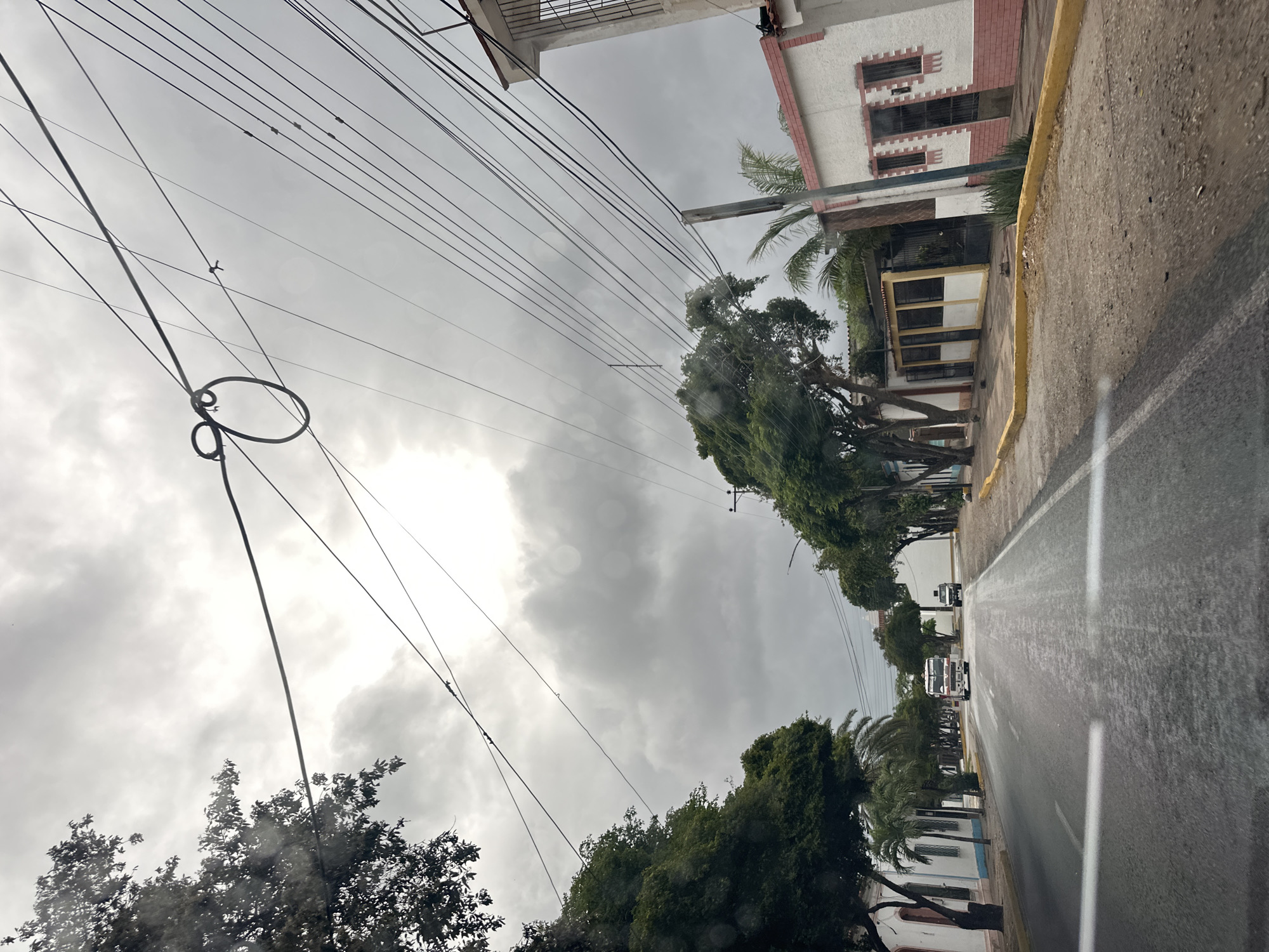 Rainy evening drive through Santa Ana, Venezuela streets