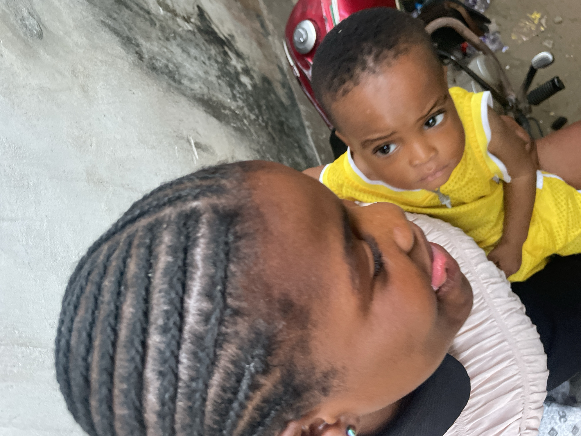 Mother and baby share tender moment in Badagry