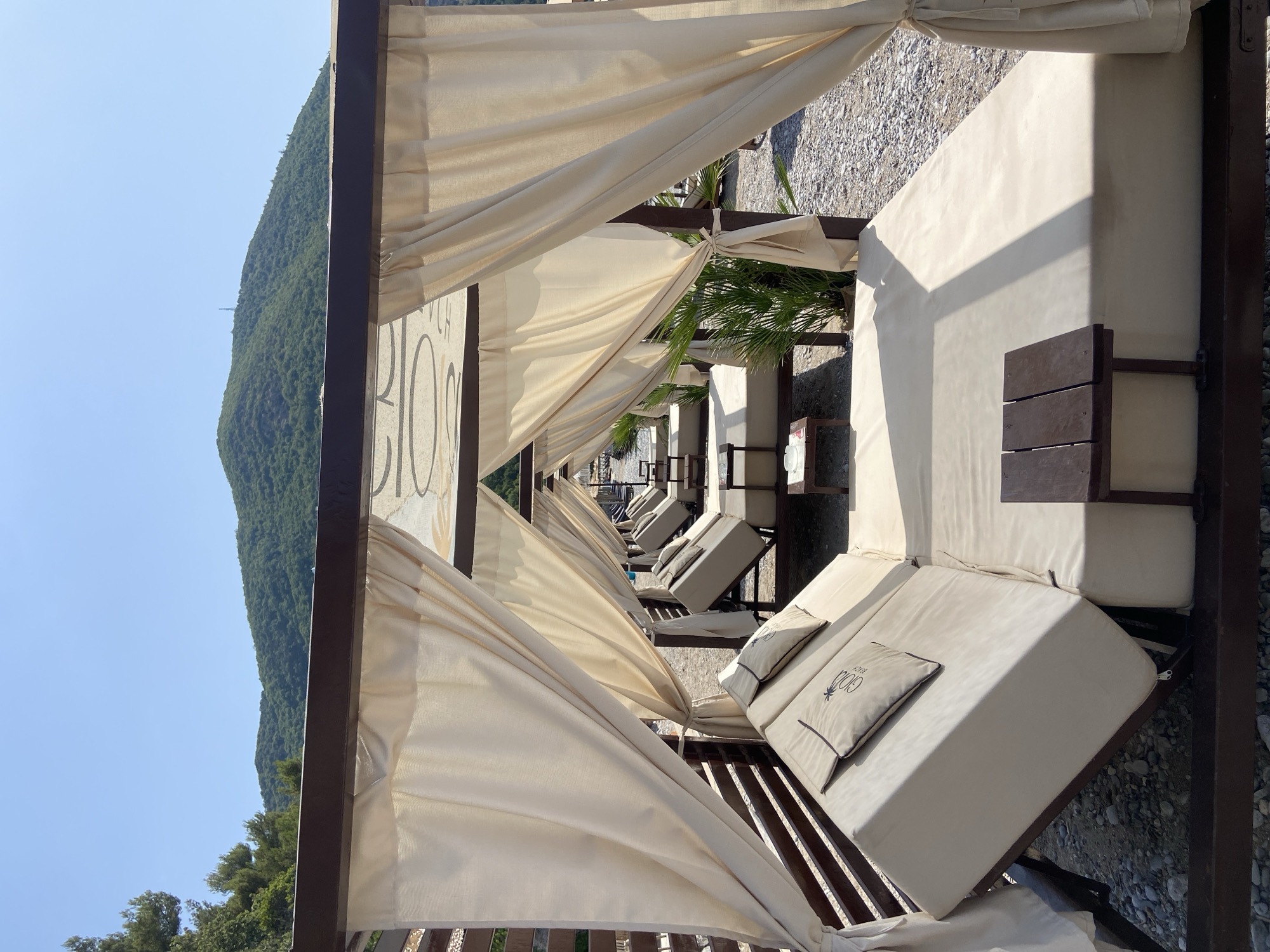 Lazy summer morning on a Montenegrin pebble beach
