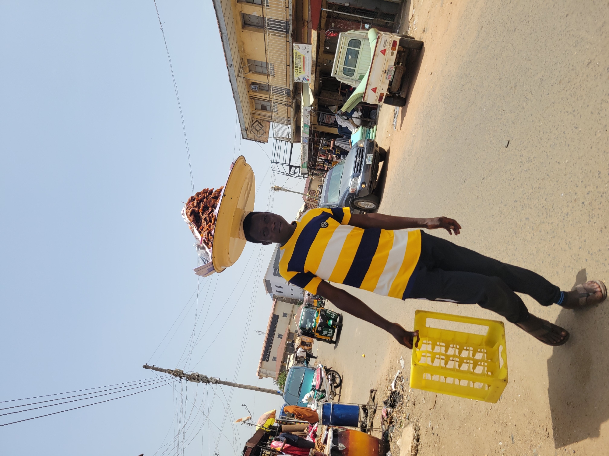 Daily street commerce and pedestrian activity observed in Jos, Nigeria