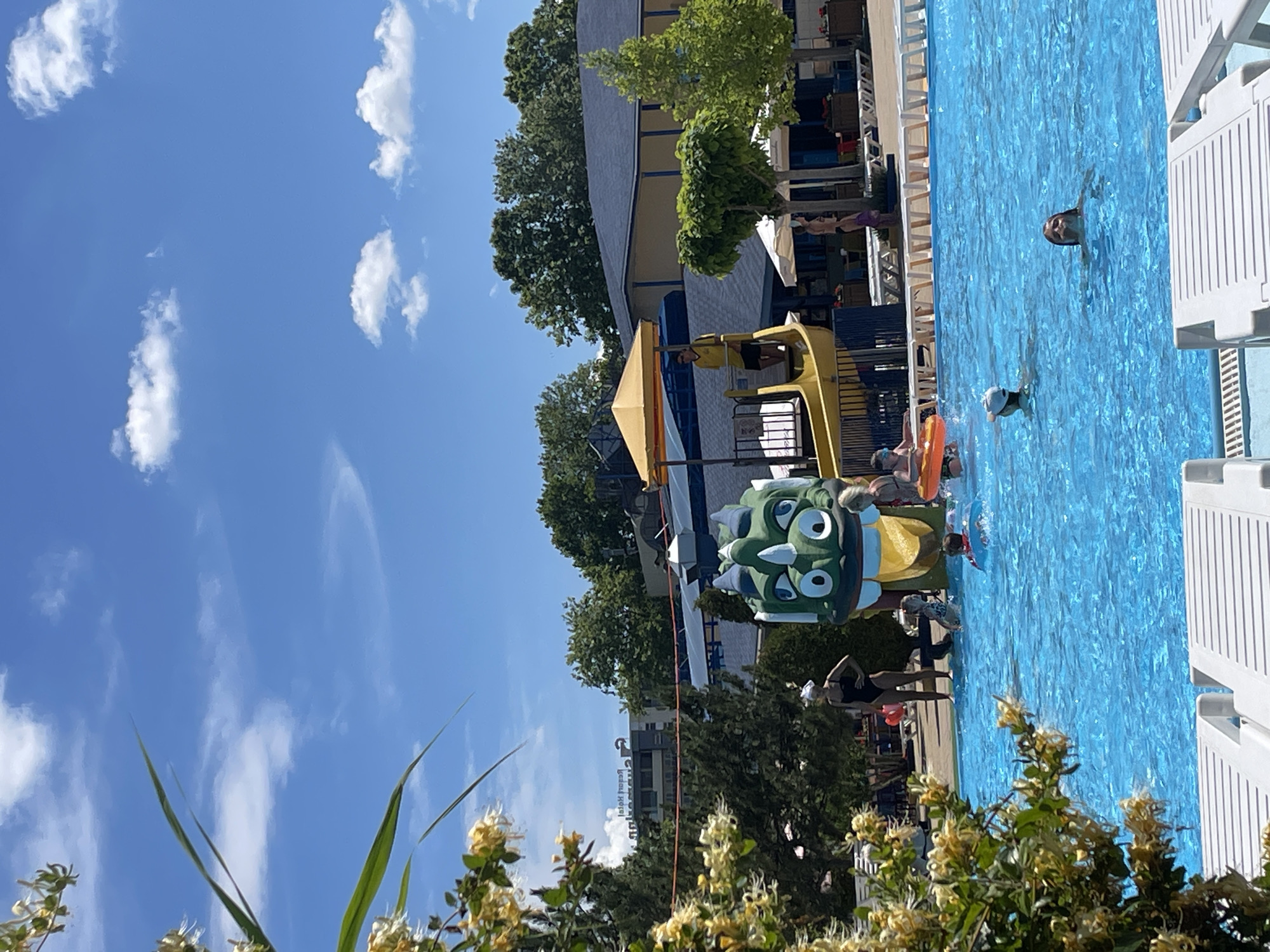 Beach resort day: pool, sand, selfies, and sunny walkways