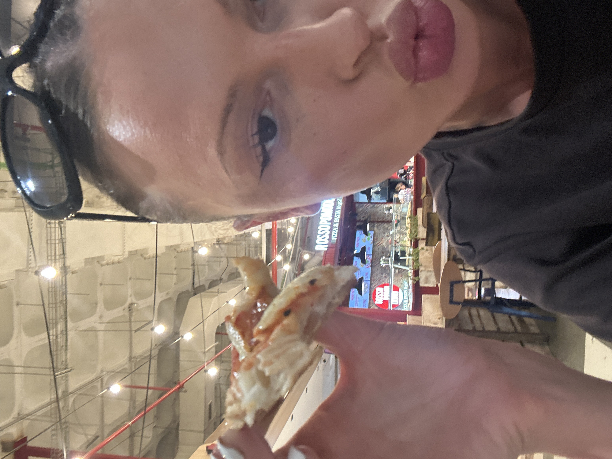 Person captures pizza selfie in Sant Josep de sa Talaia