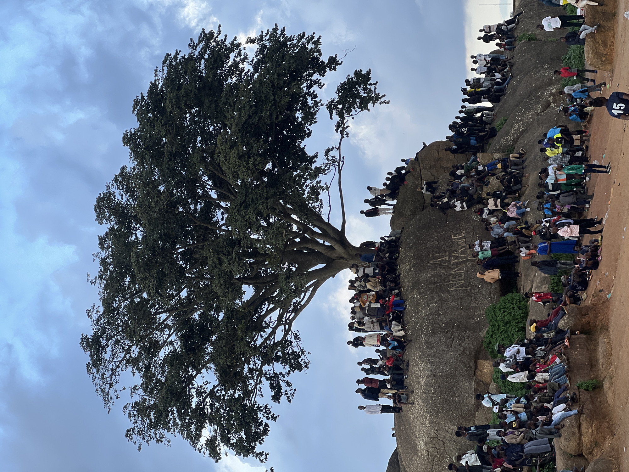 Informal football match draws a crowd at Jos rocky field