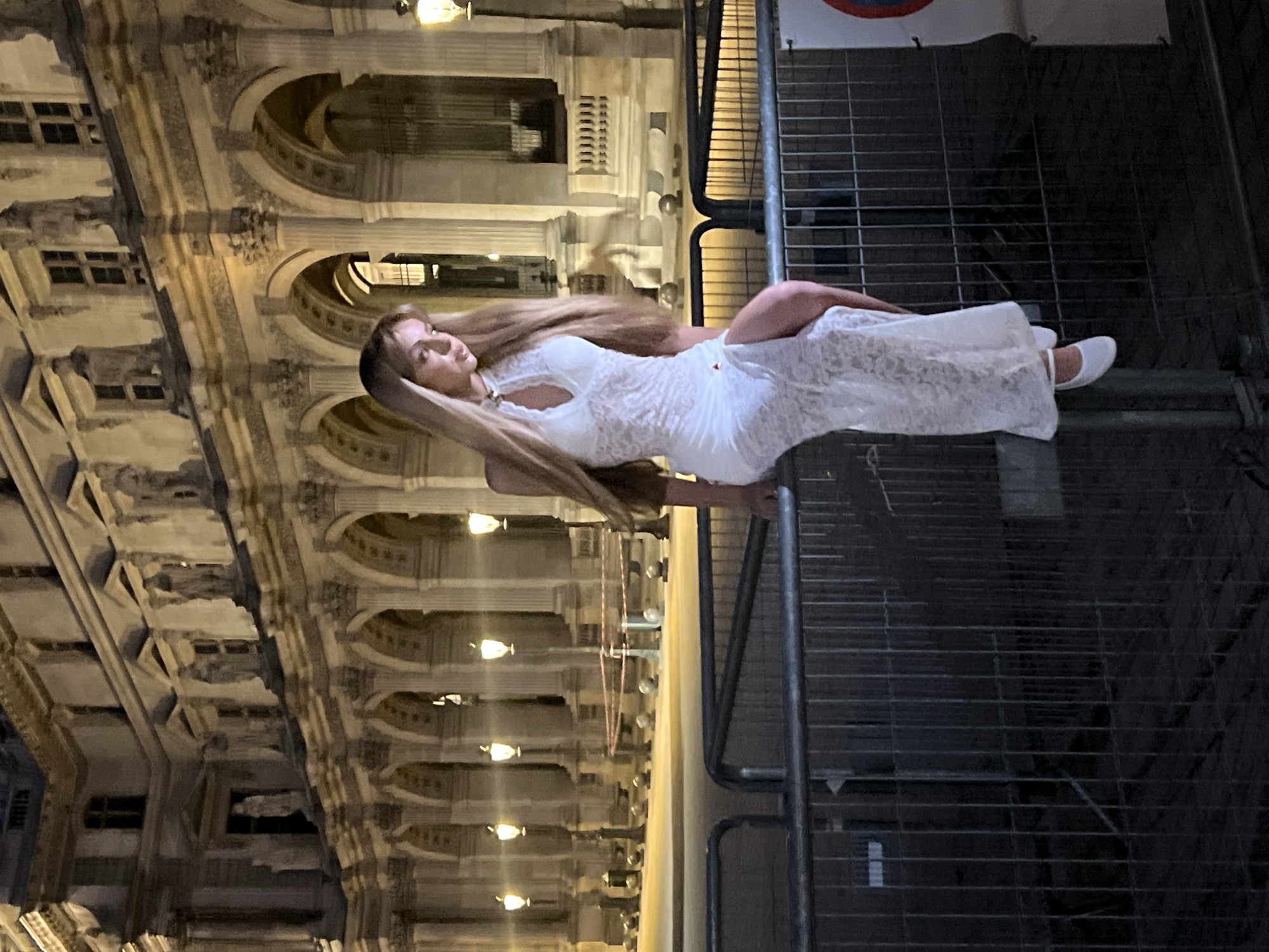 Evening scenes captured around illuminated Louvre Museum in Paris