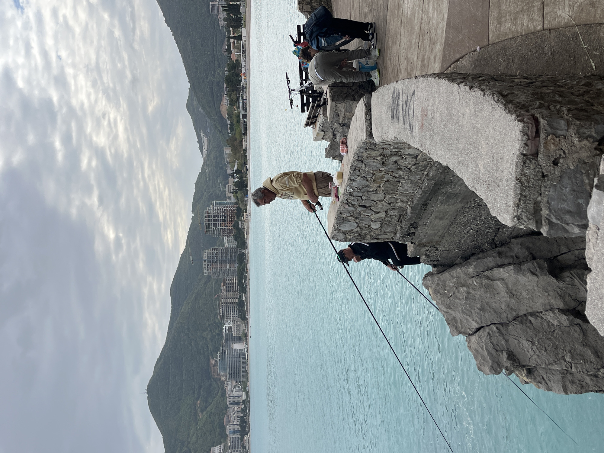 Fishing group spotted along Budva coastline amid choppy seas