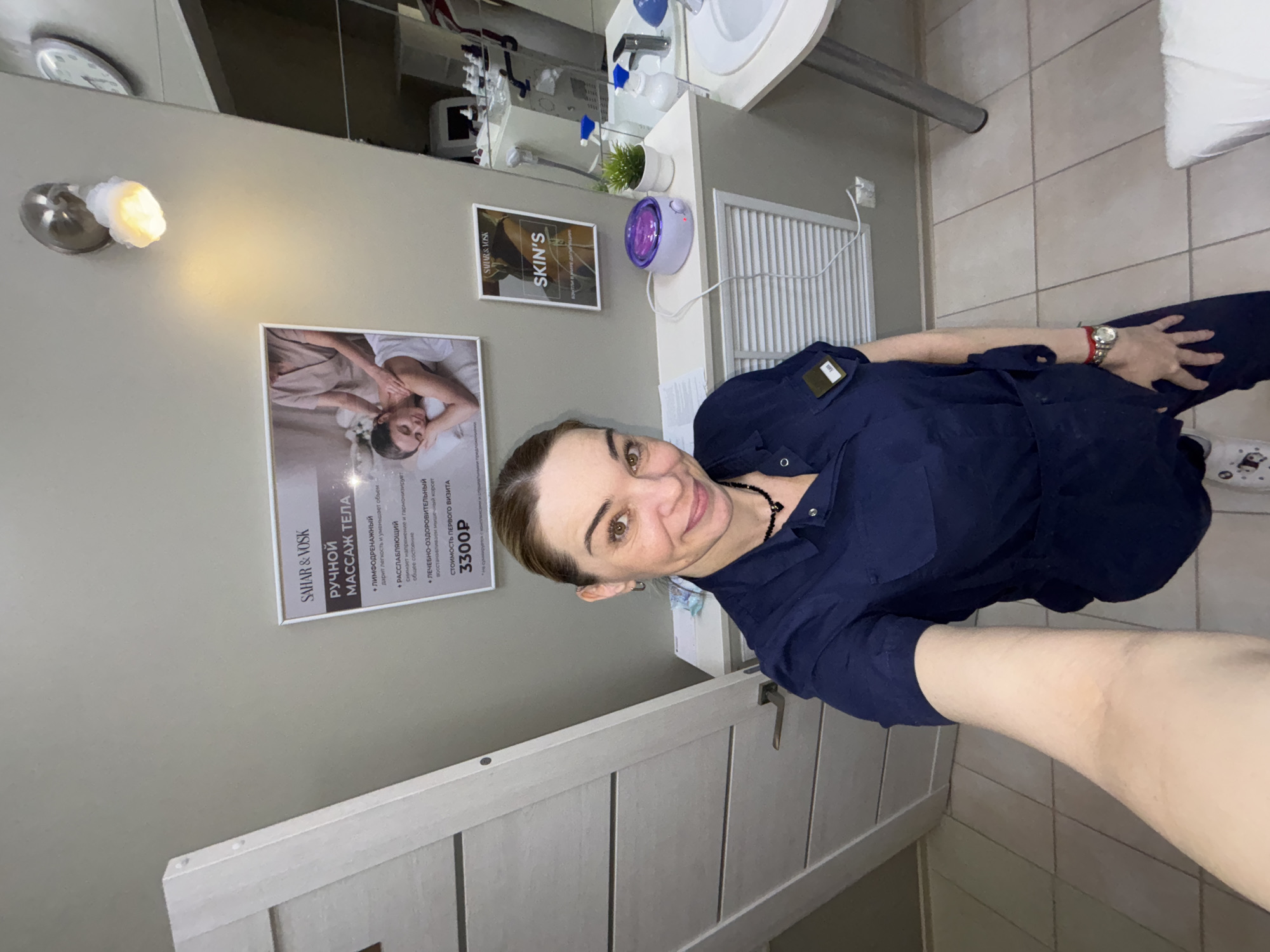 Professional takes selfies in salon or medical facility