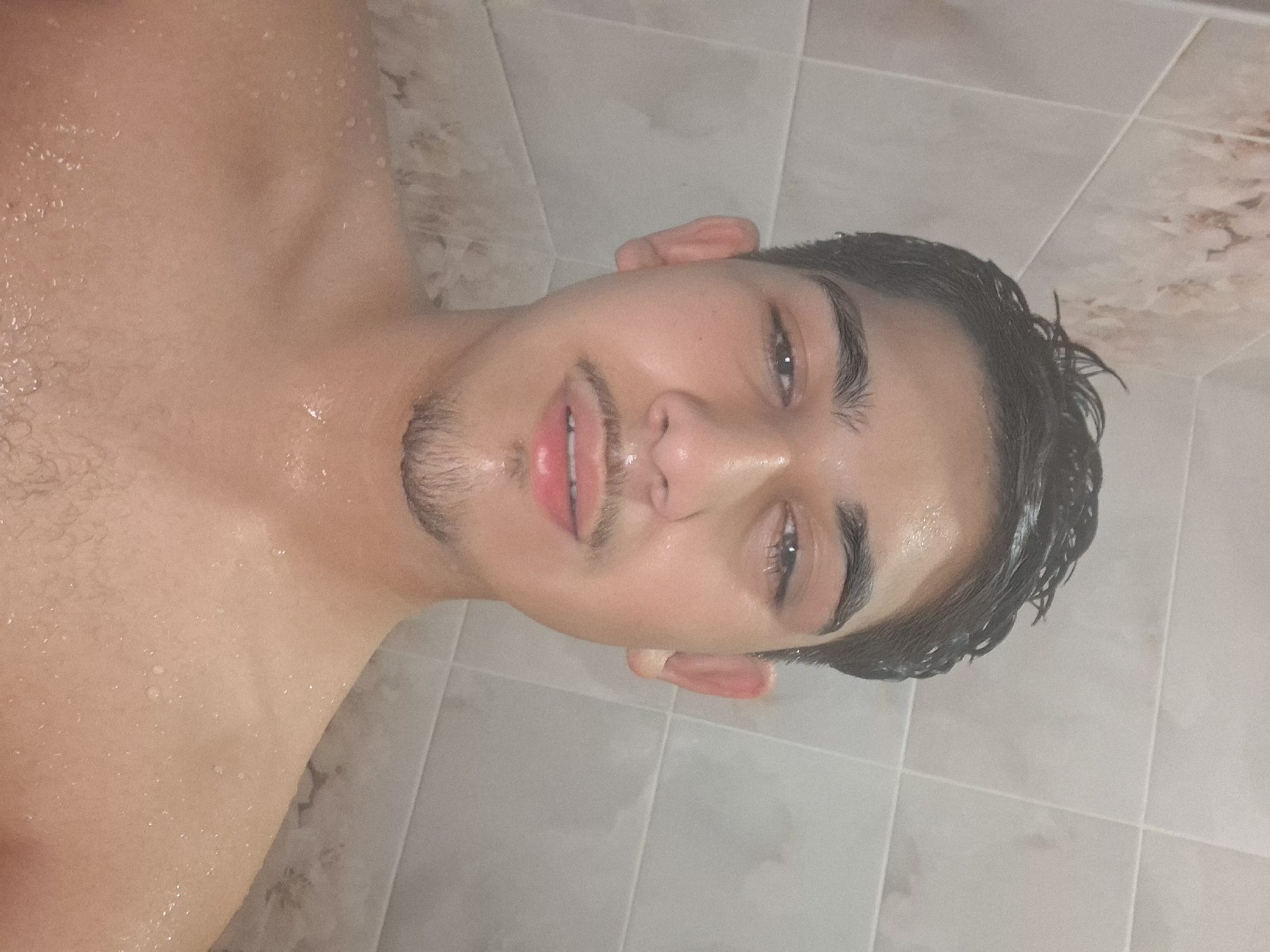 Wet individual photographed against tiled wall in Dolni Lukovit