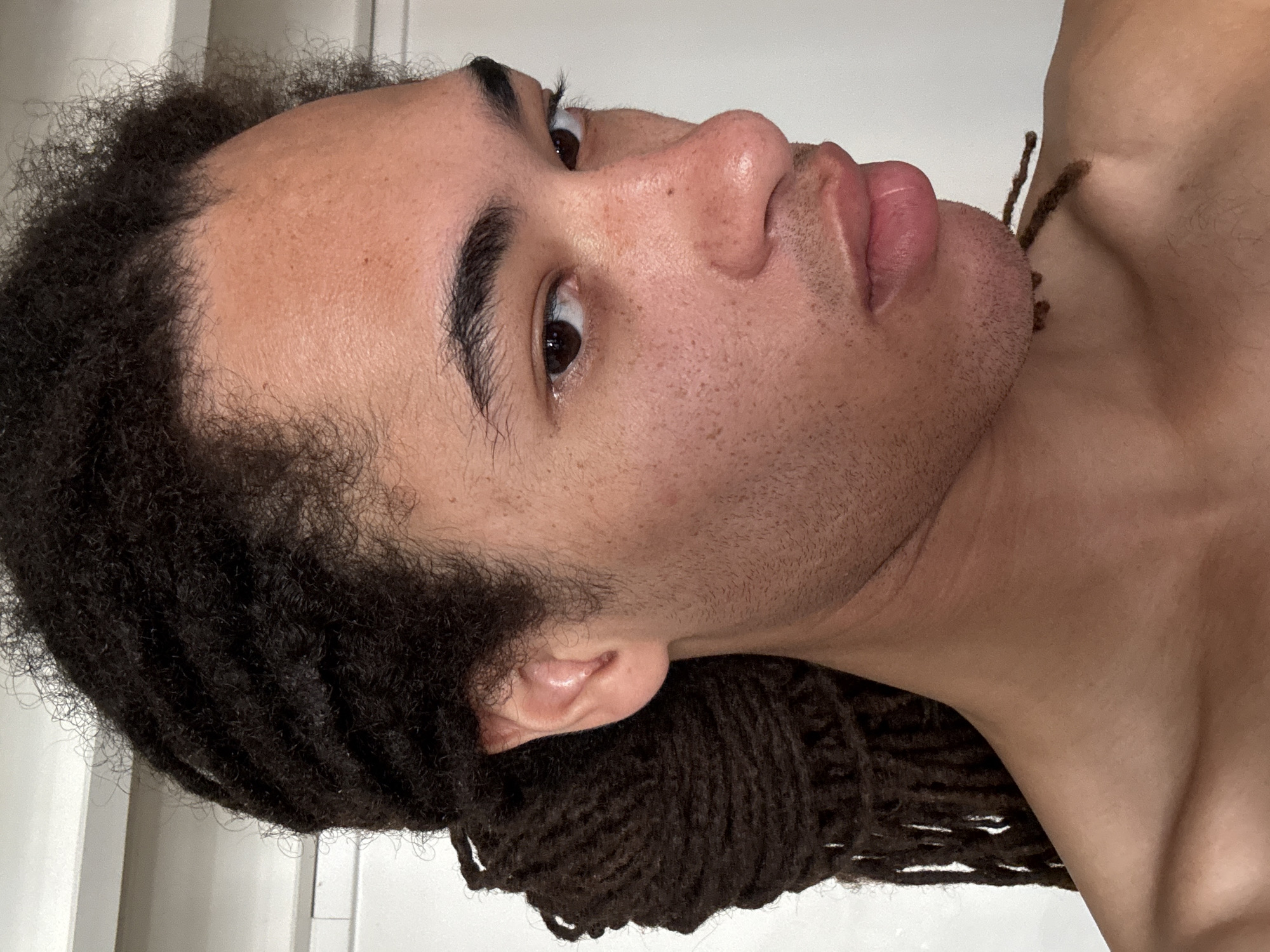 Portrait photos captured of dreadlocked individual in Paris