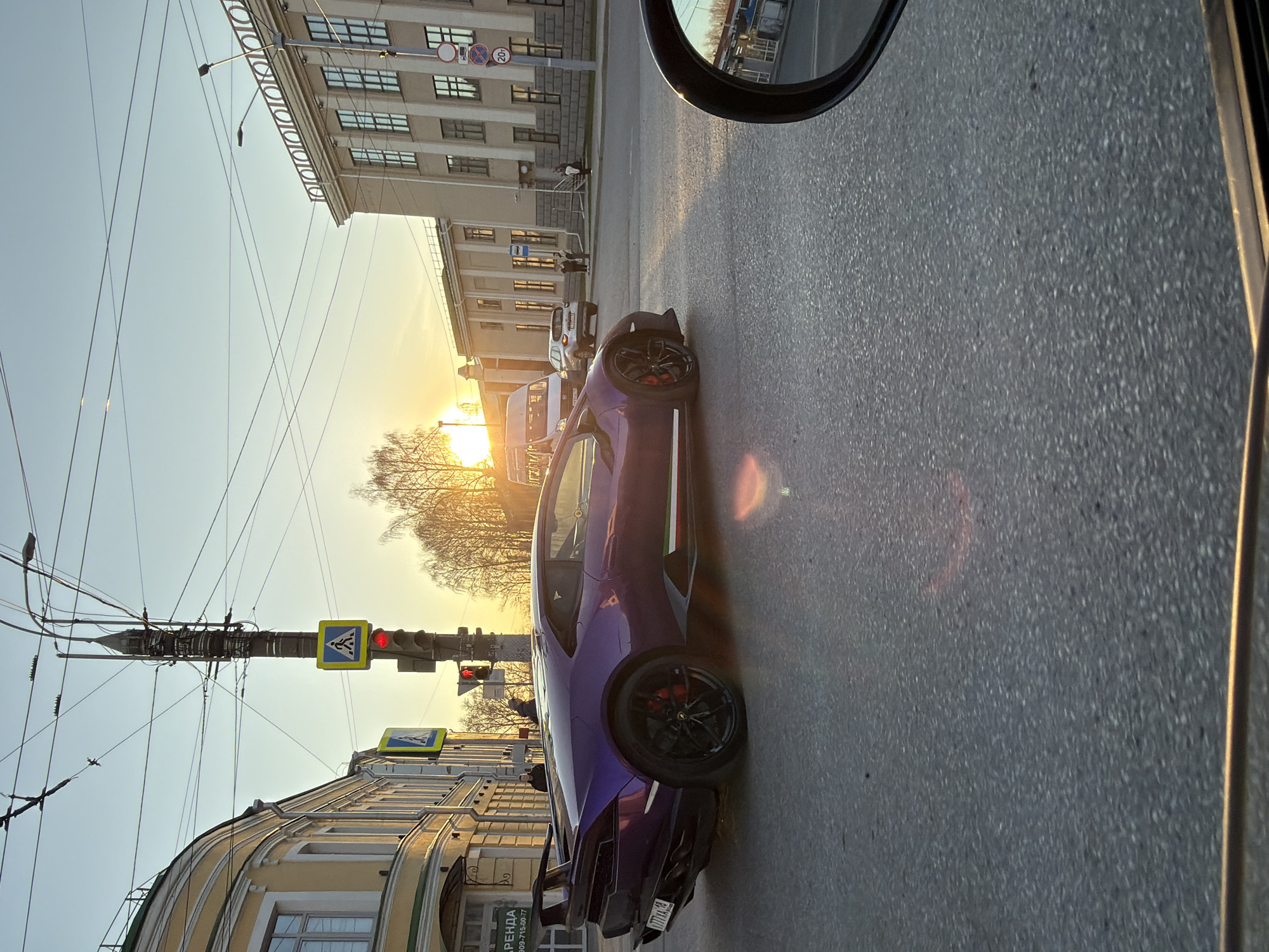Purple Lamborghini spotted parked on Izhevsk street at sunset