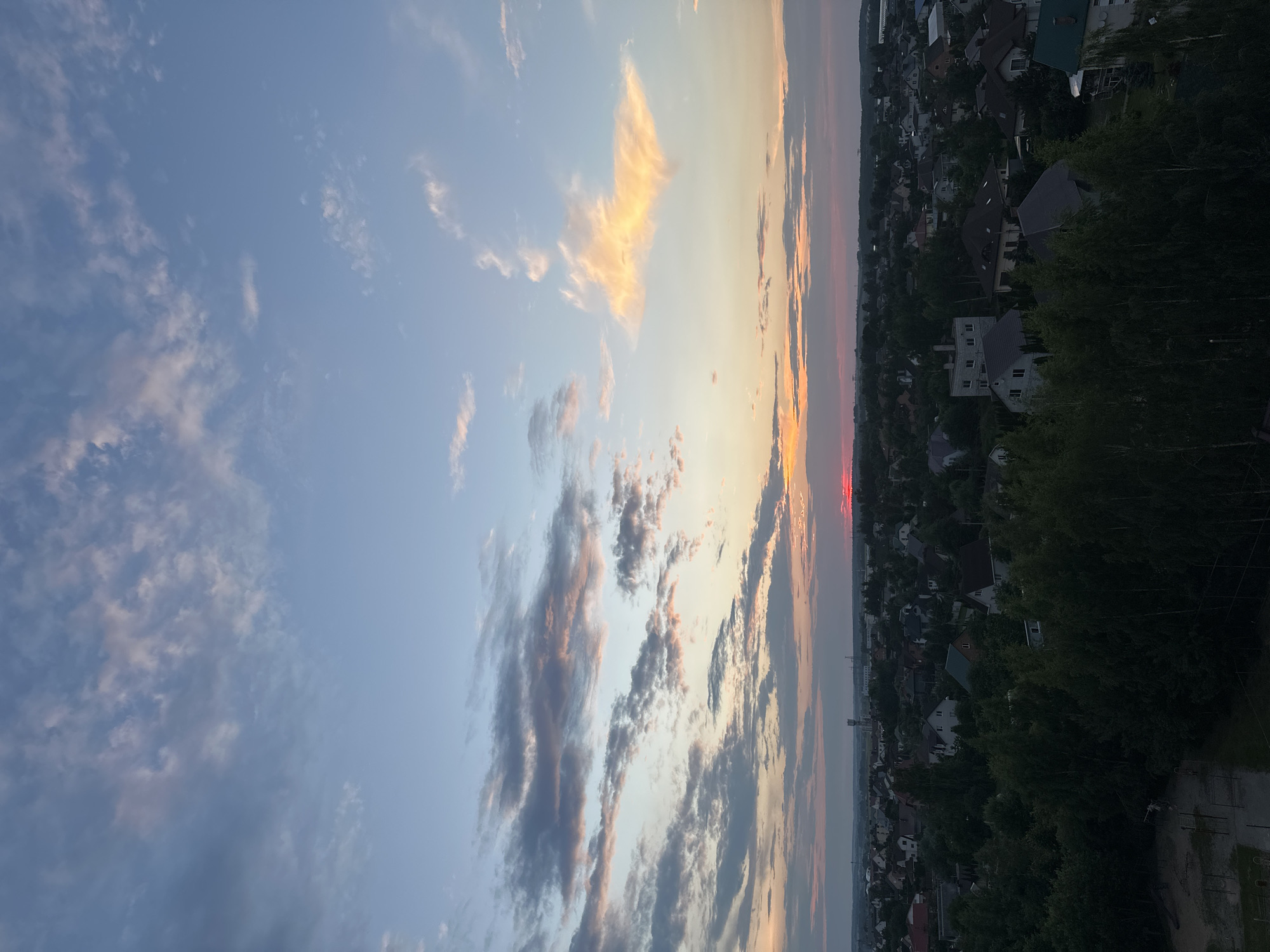 Solstice sunset aerial over suburban Minsk outskirts, Belarus