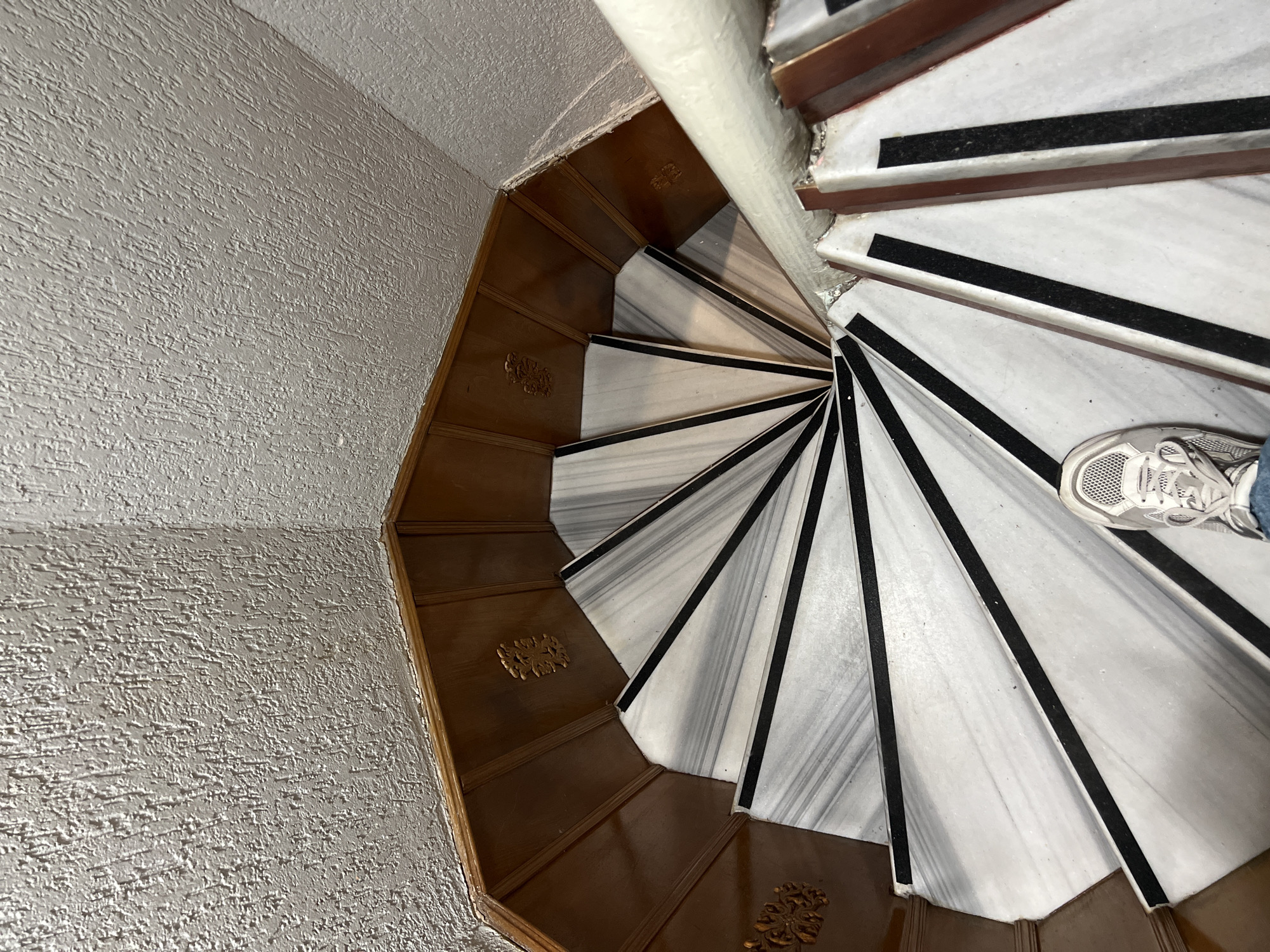 Spiral staircase with marble and wood documented in Istanbul