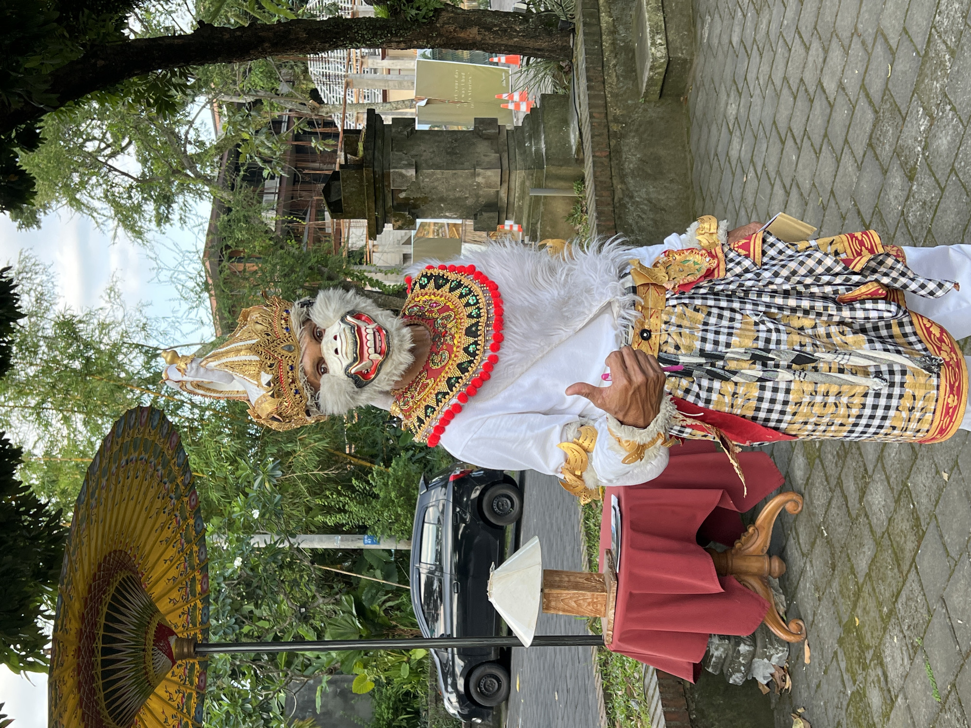Traditional Balinese performer spotted in ceremonial dress in Ubud