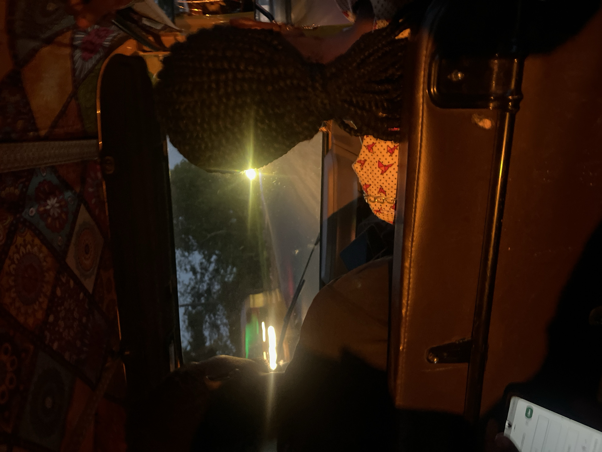 Evening vehicle interior photographed in Karmajiji, Nigeria
