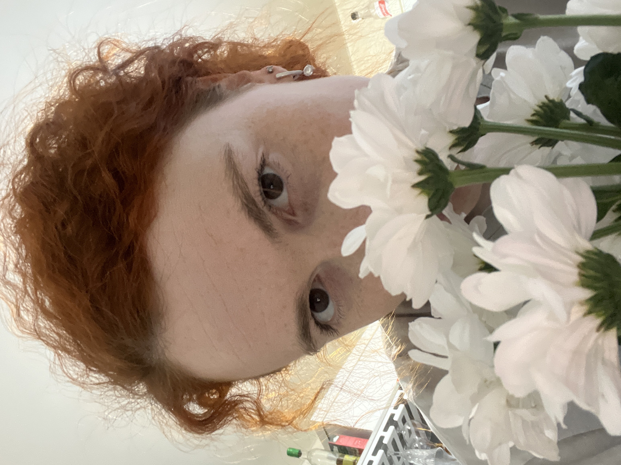 Woman takes selfies indoors in Chaikovsky, Russia