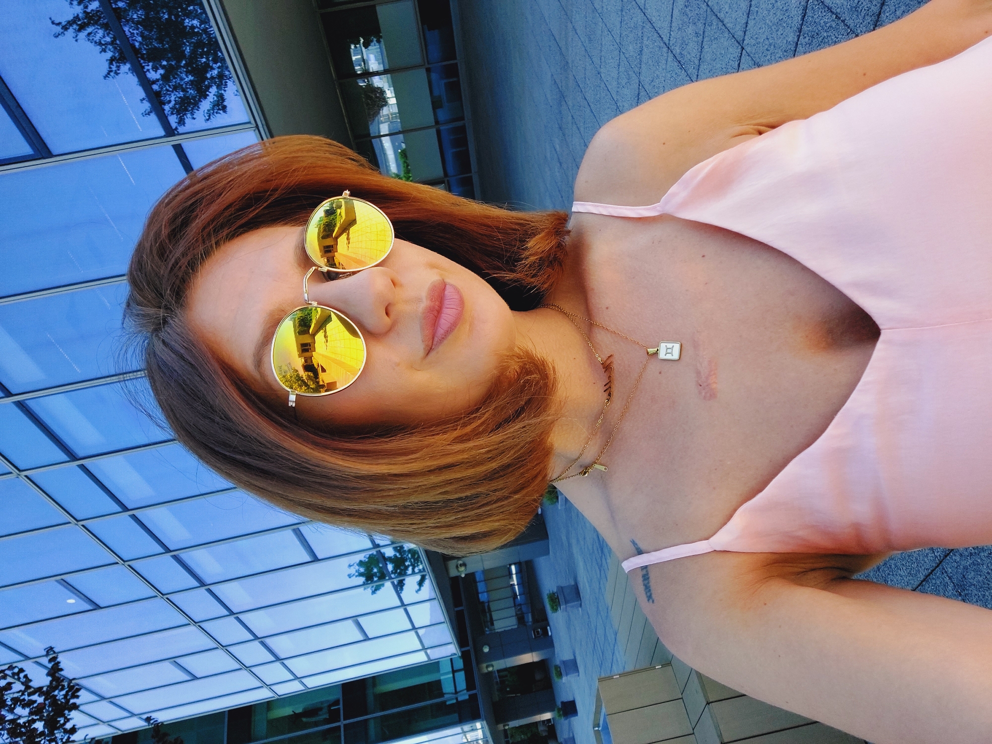 Selfie series around a glass building in sunny Sofia