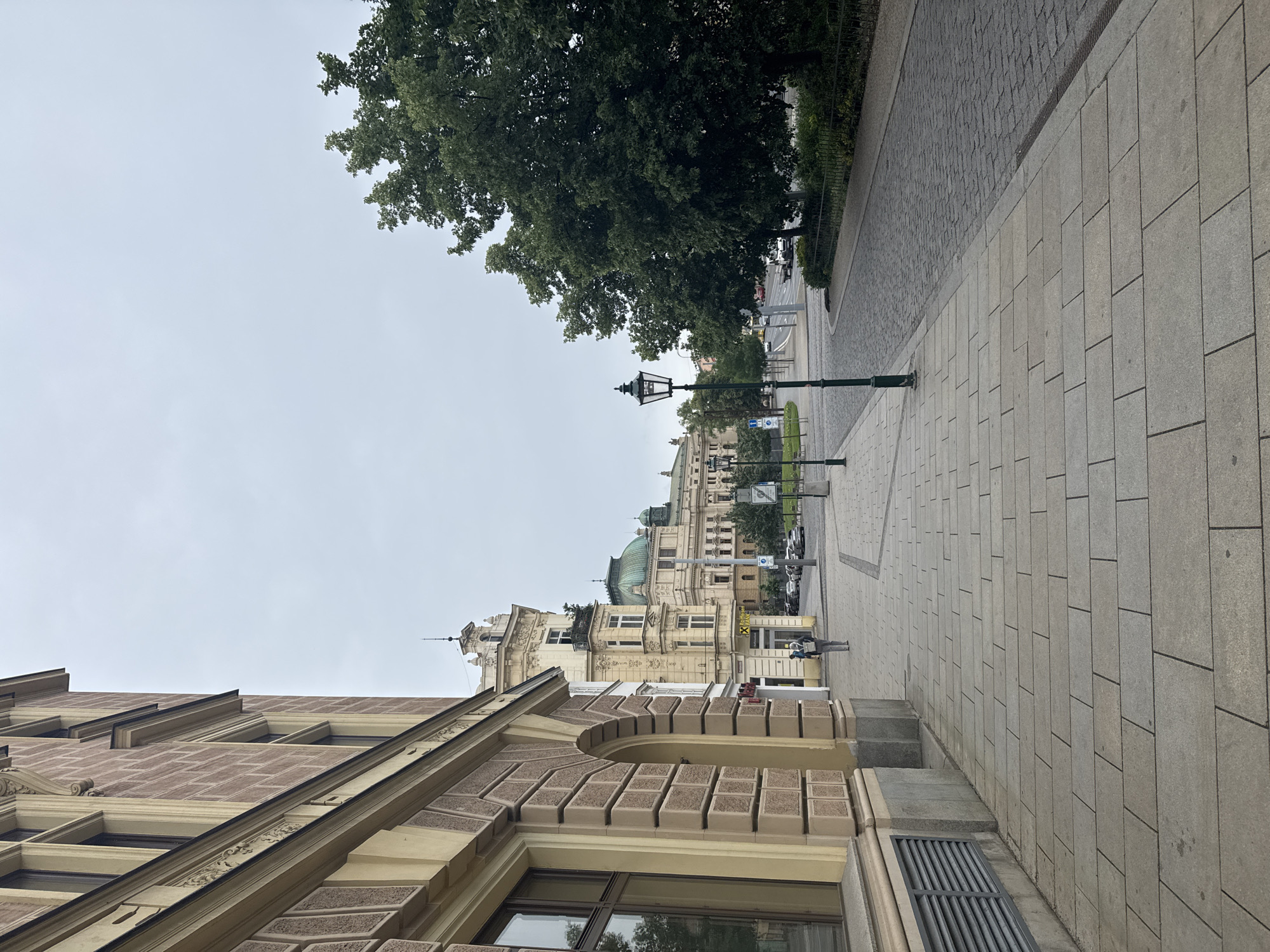 Morning street scenes documented across central Pilsen under overcast skies
