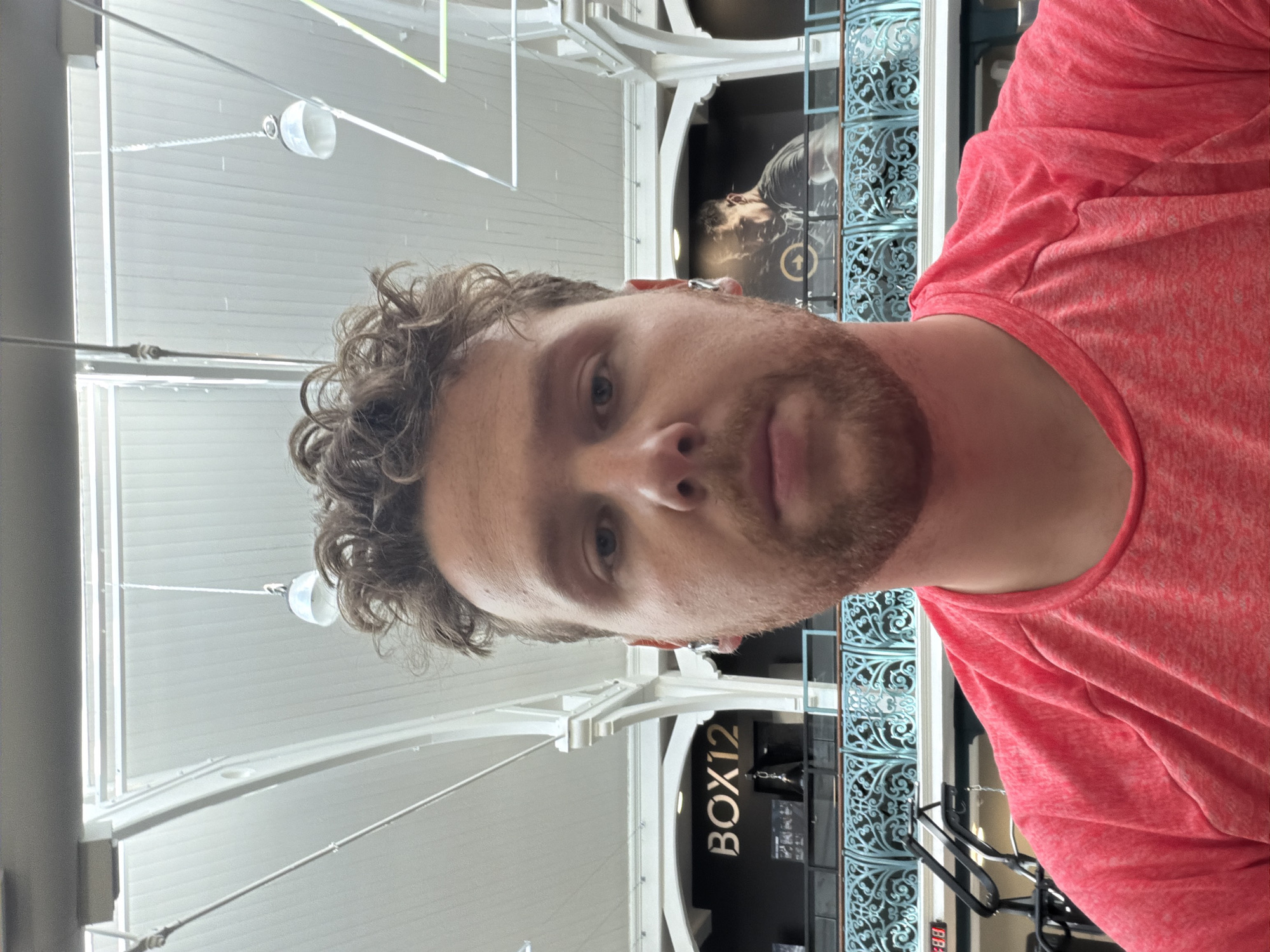 Person in red shirt captured at London gym